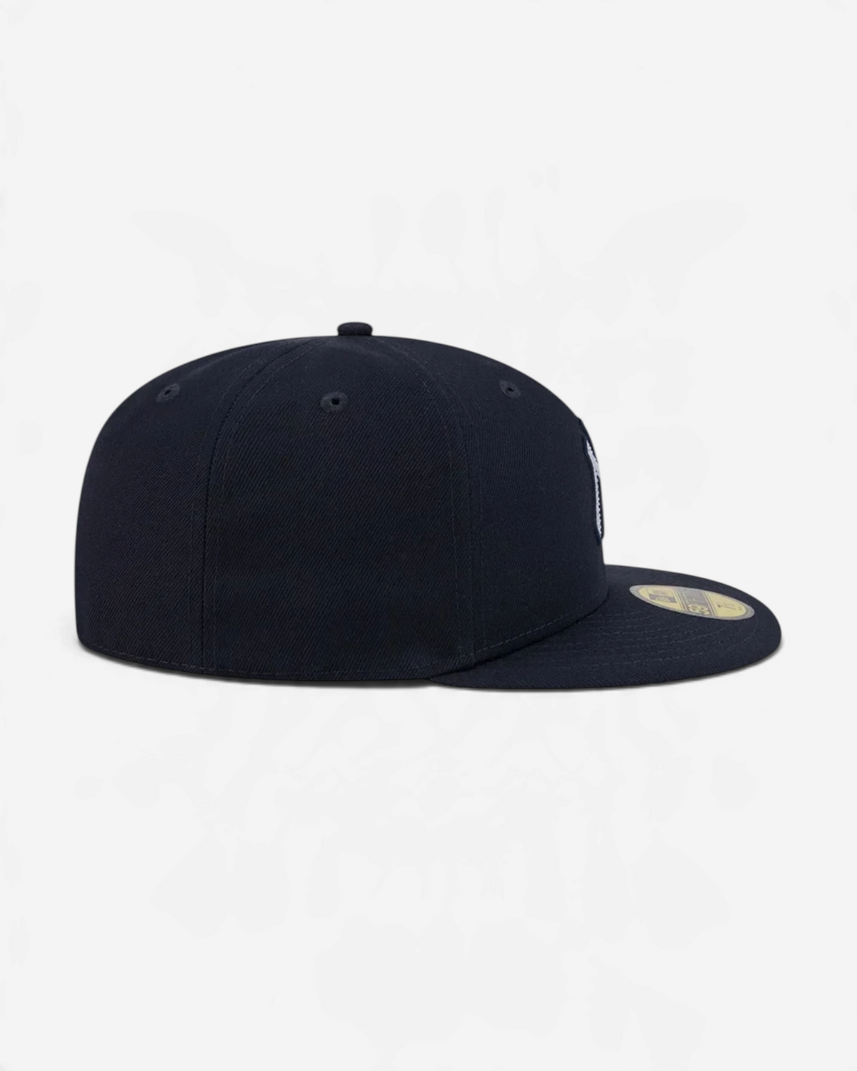 Astrofat navy 59FIFTY fitted New York Yankees baseball cap with a flat visor and structured crown, side profile view.