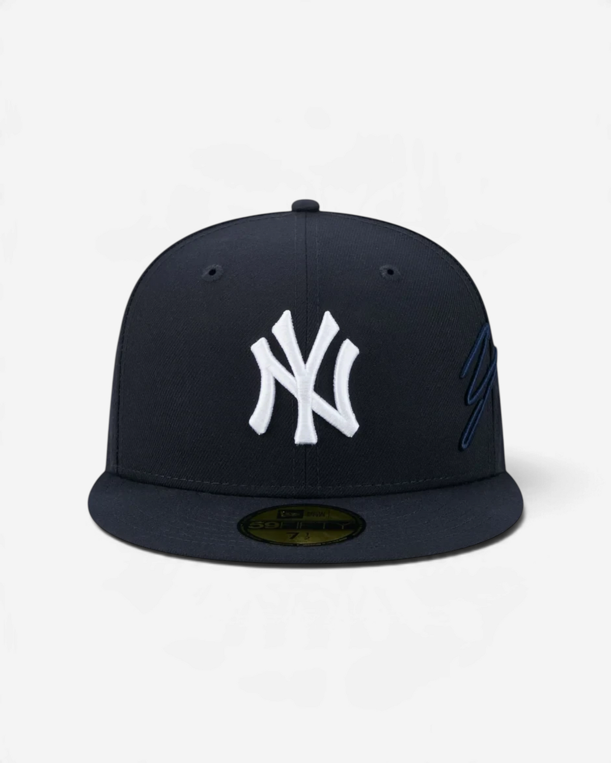 Astrofat navy blue New York Yankees 59FIFTY fitted cap with white front logo, flat visor, and side script embroidery.