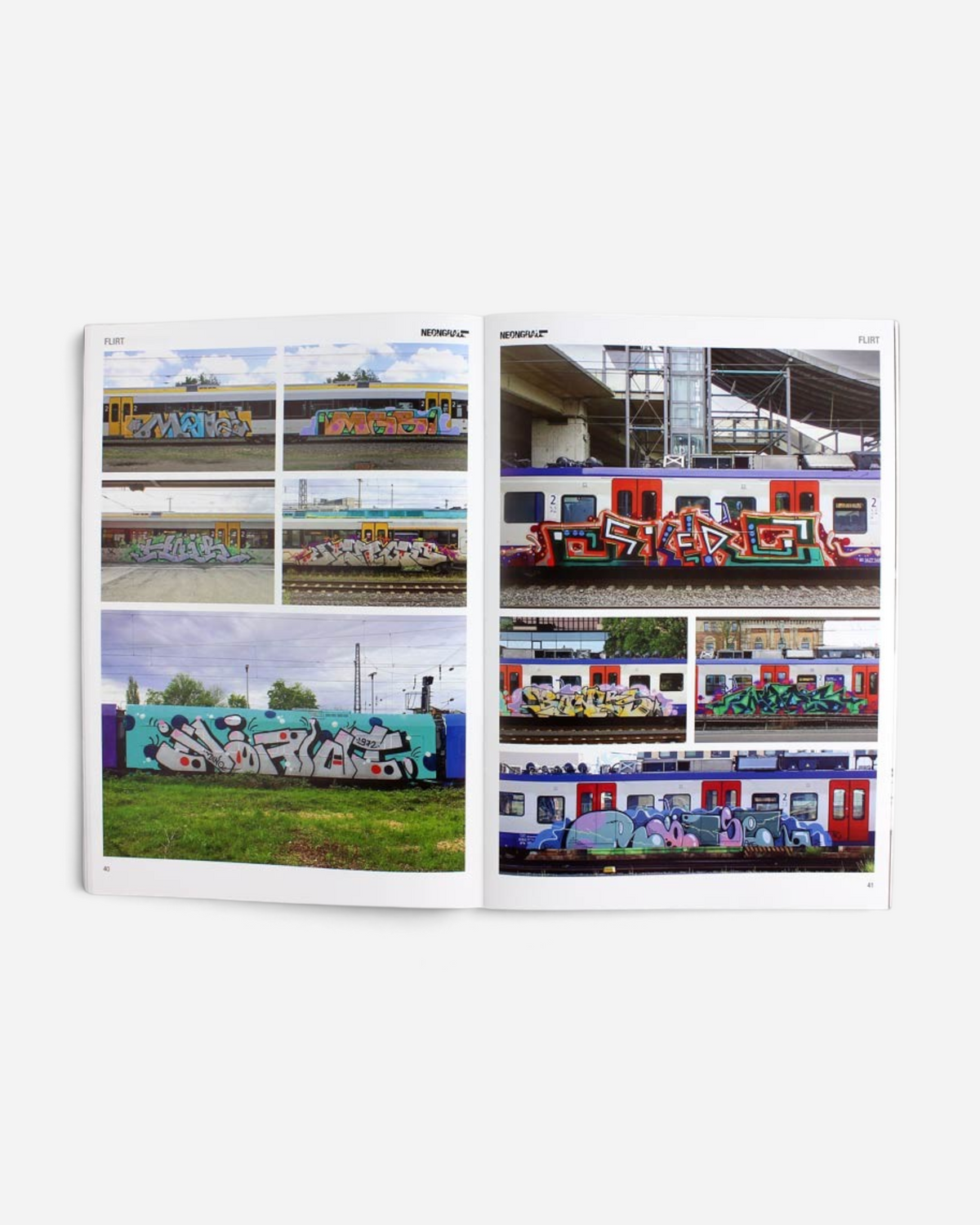 Astrofat Neongrau Magazine Issue 13 open to pages featuring graffiti art on trains and metropolitan walls.