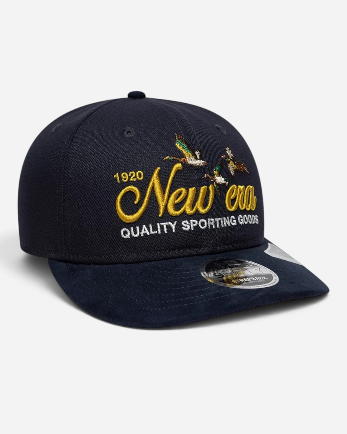 Astrofat 9FIFTY New Era navy blue cap with a suede visor, featuring embroidered duck graphics and gold lettering.