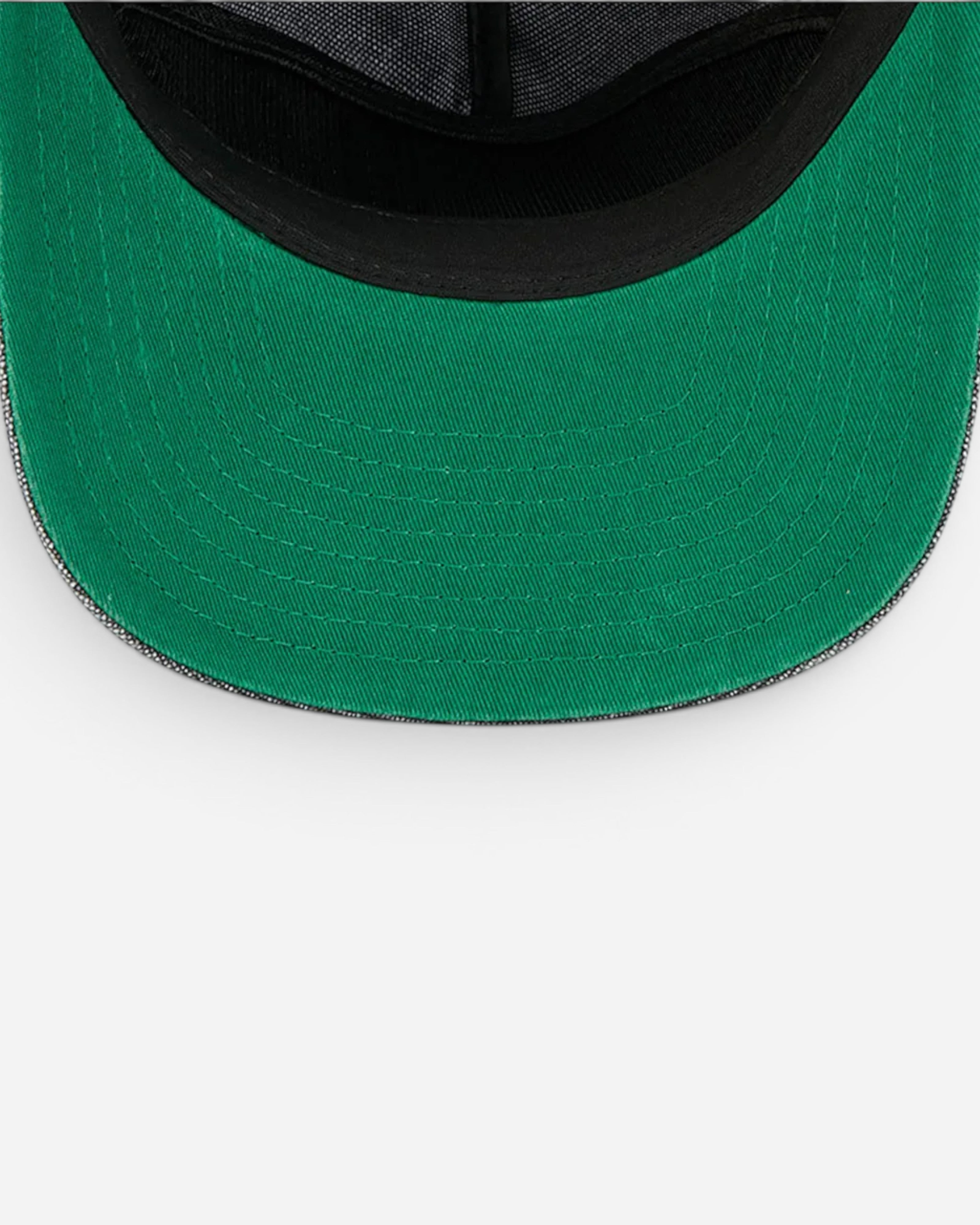 Astrofat New York Yankees championship baseball cap with a green undervisor and adjustable strapback closure.
