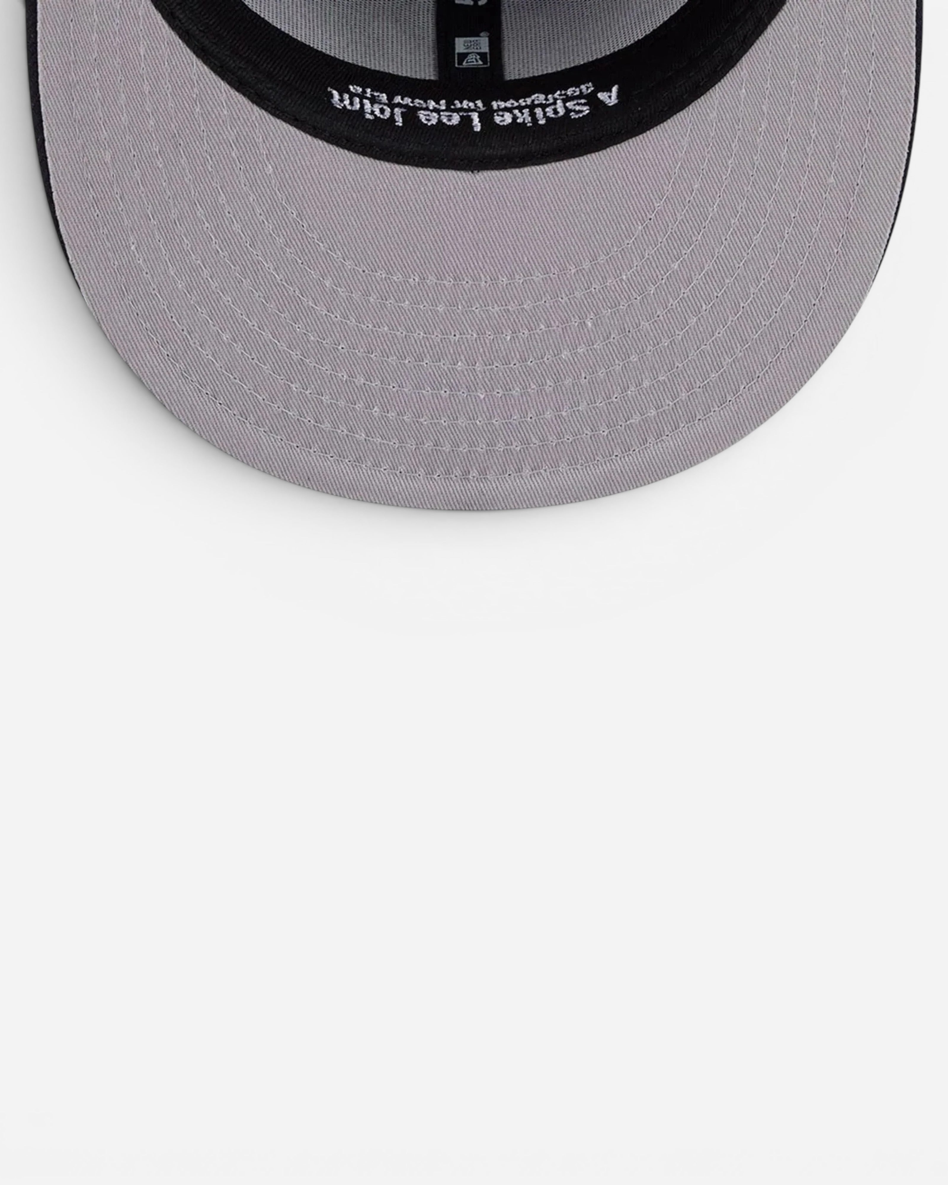 Astrofat New York Yankees 59FIFTY fitted cap featuring a grey undervisor and Spike Lee branding on the inner band.