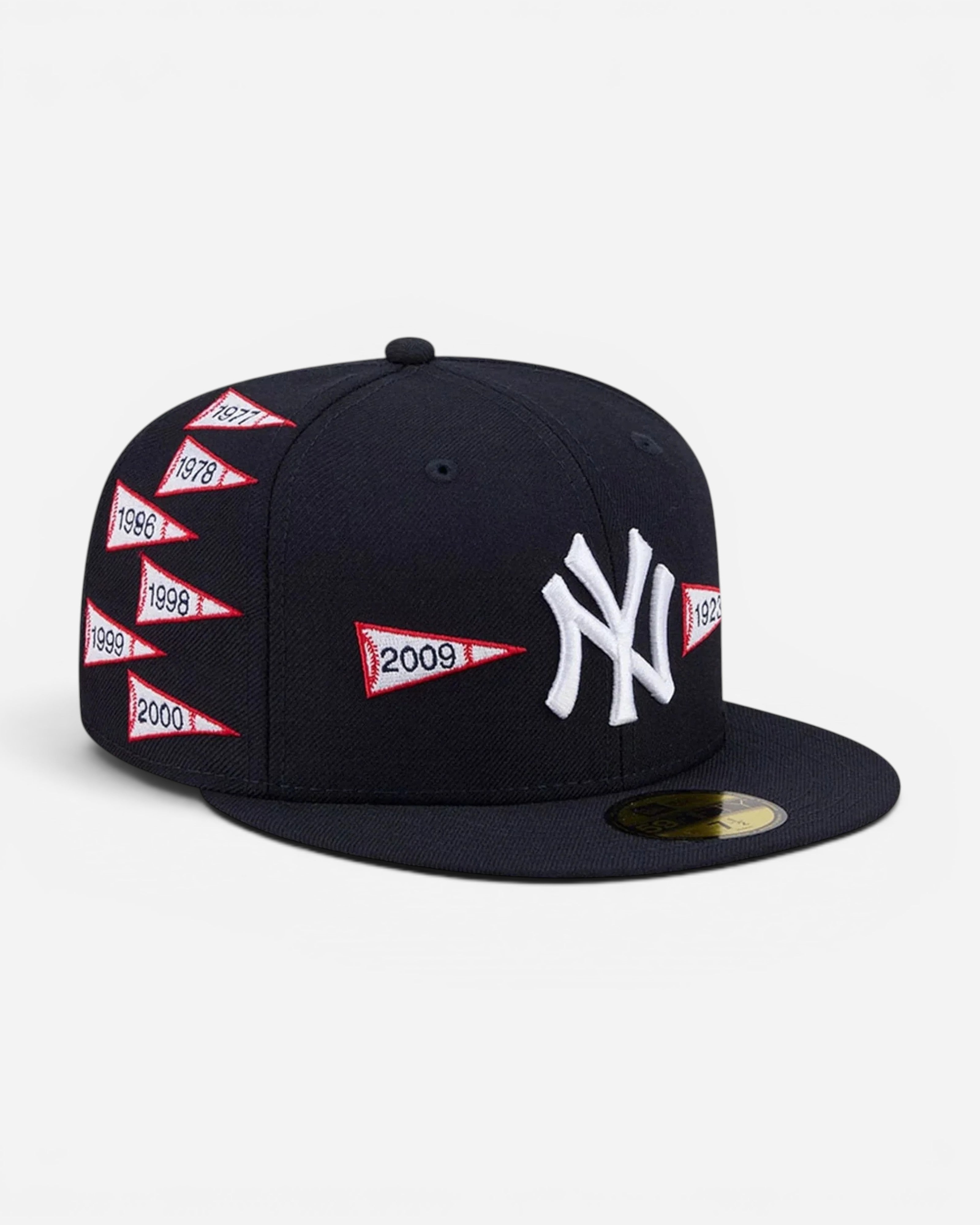 Astrofat New York Yankees 59FIFTY fitted cap in navy blue with embroidered championship flag patches and white logo.