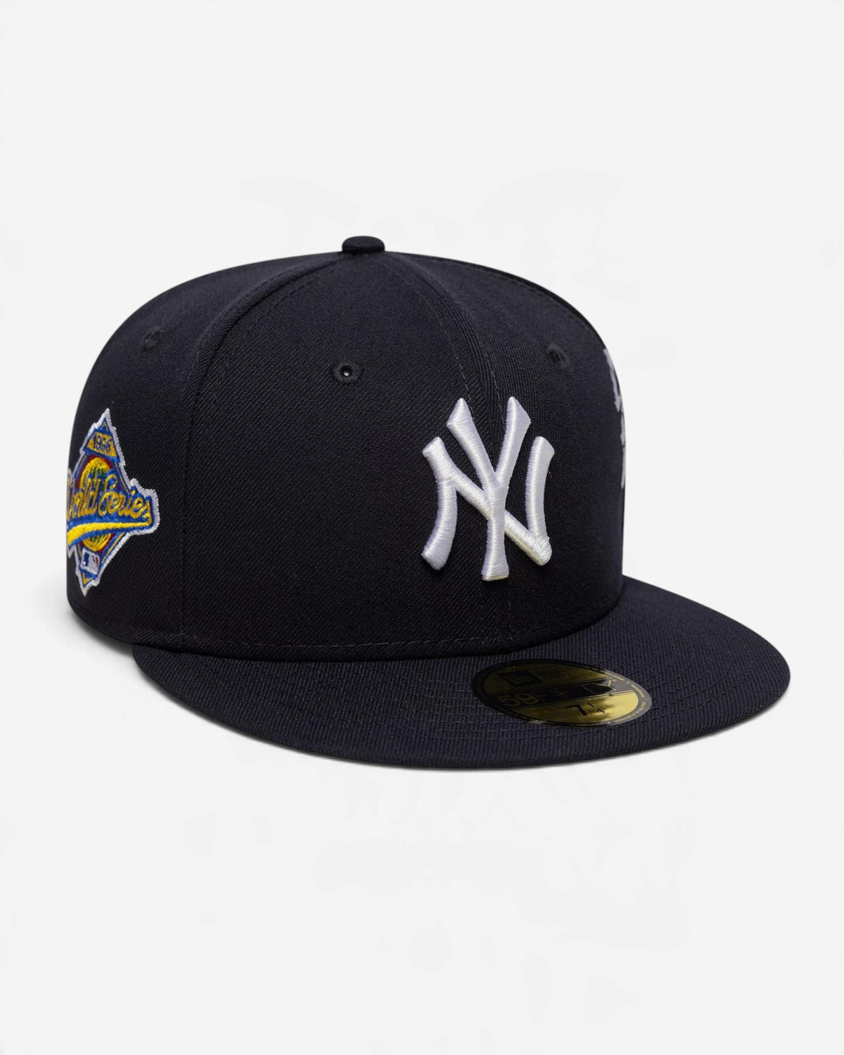 Astrofat black 59FIFTY New York Yankees fitted cap with white NY logo, World Series patch, and flat visor.
