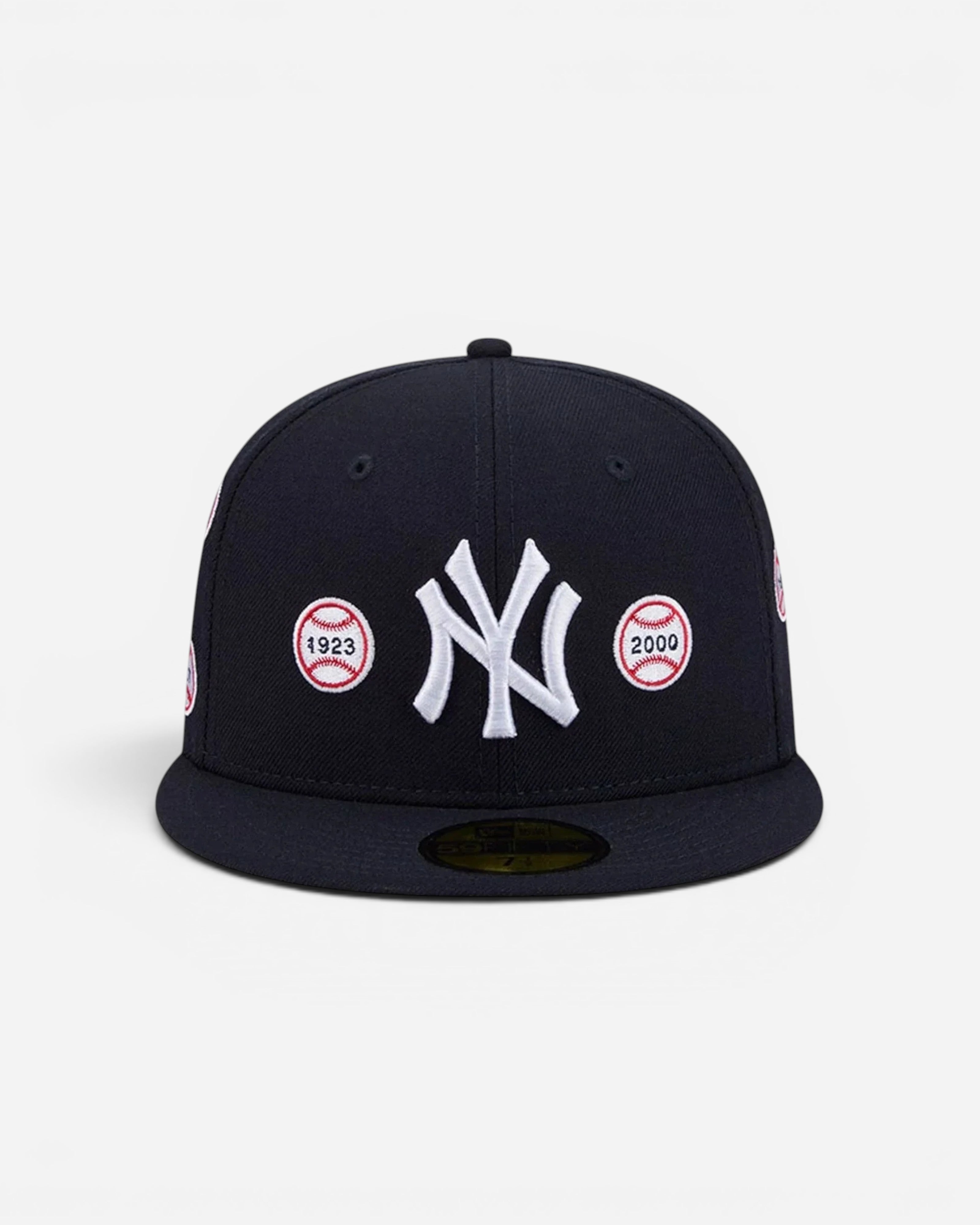 Astrofat navy blue 59FIFTY New York Yankees fitted cap with white World Series patches and flat visor