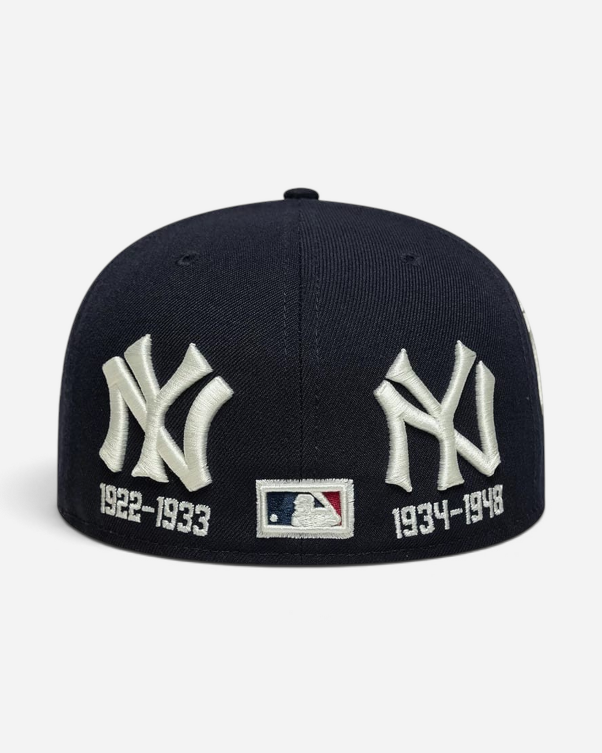 Astrofat navy blue New York Yankees 59FIFTY low profile fitted cap featuring historic team logos and date embroidery.