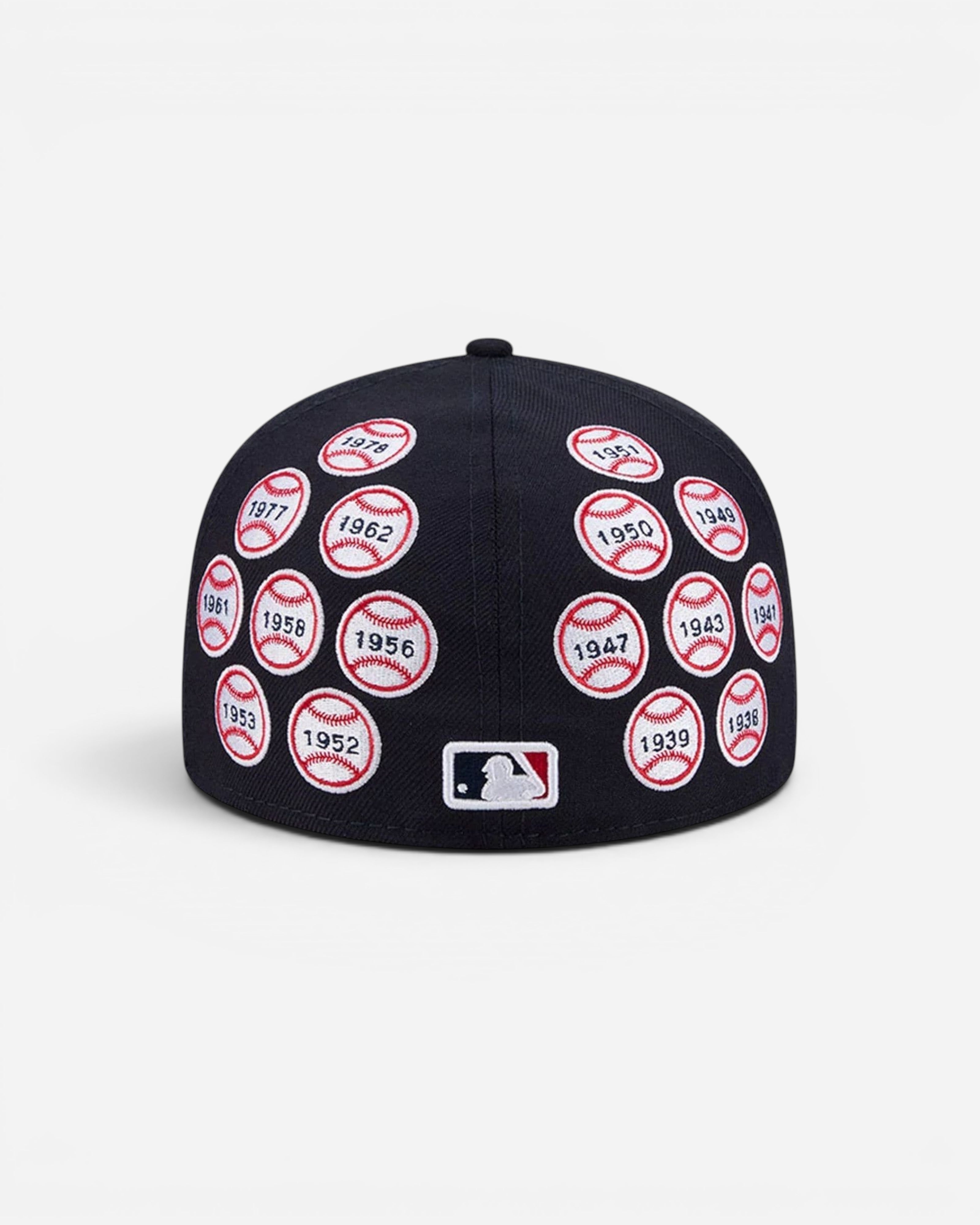 Astrofat navy blue wool 59FIFTY New York Yankees fitted cap featuring embroidered World Series patches.