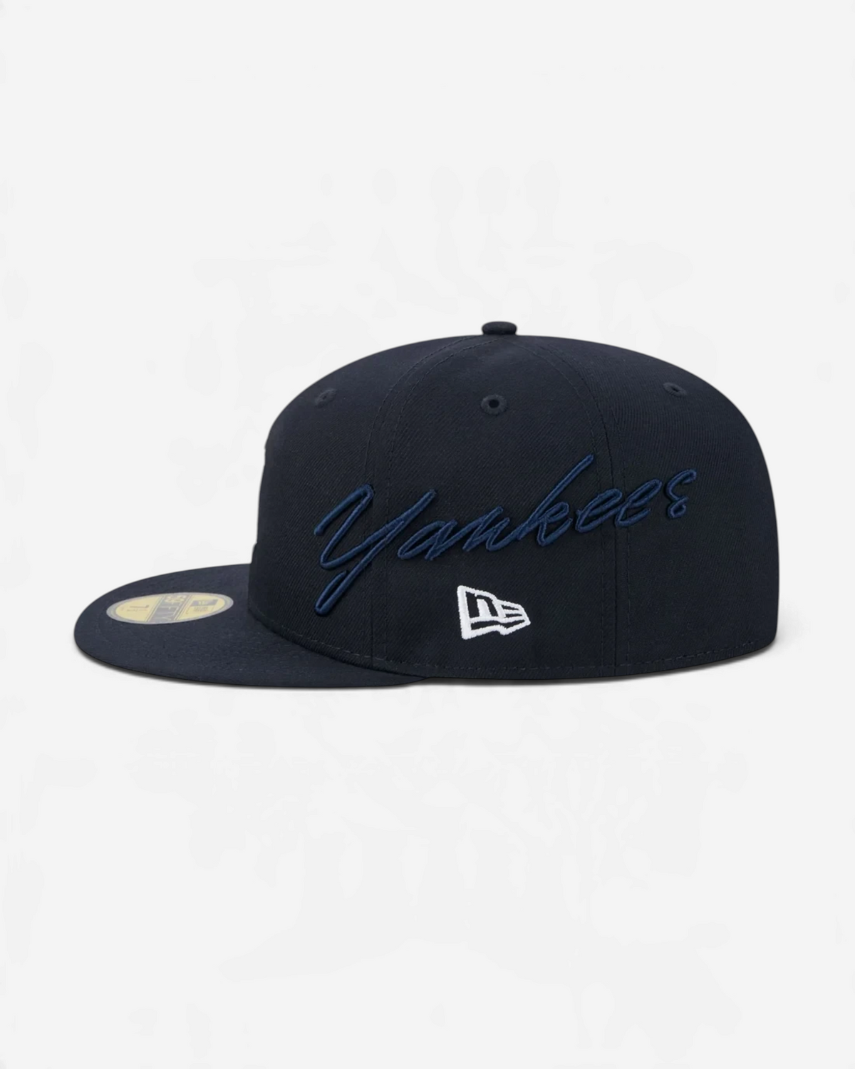 Astrofat navy blue New York Yankees 59FIFTY fitted cap with side script embroidery and flat visor