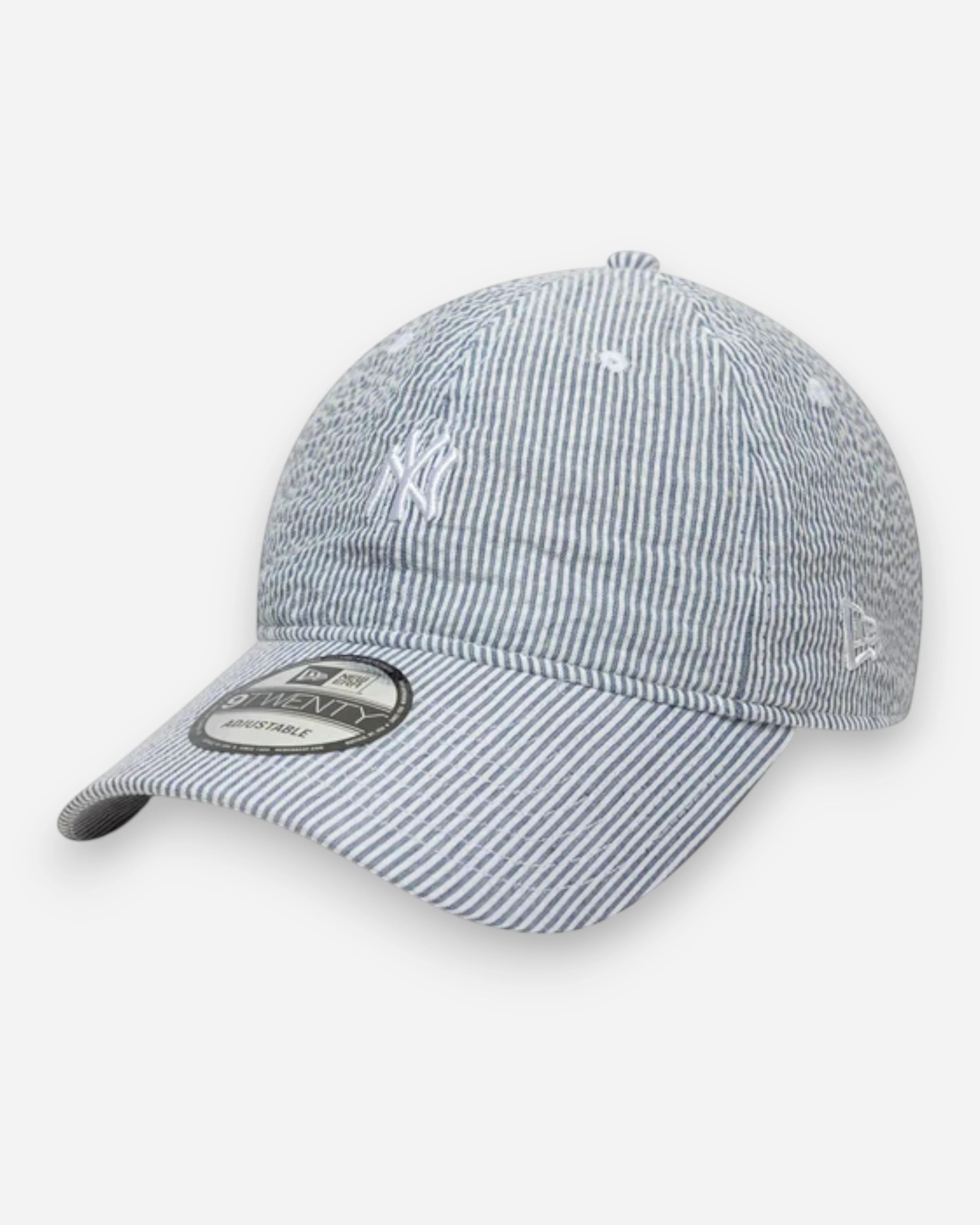 Astrofat New York Yankees 9TWENTY seersucker baseball cap in navy and white with adjustable strapback and curved brim.