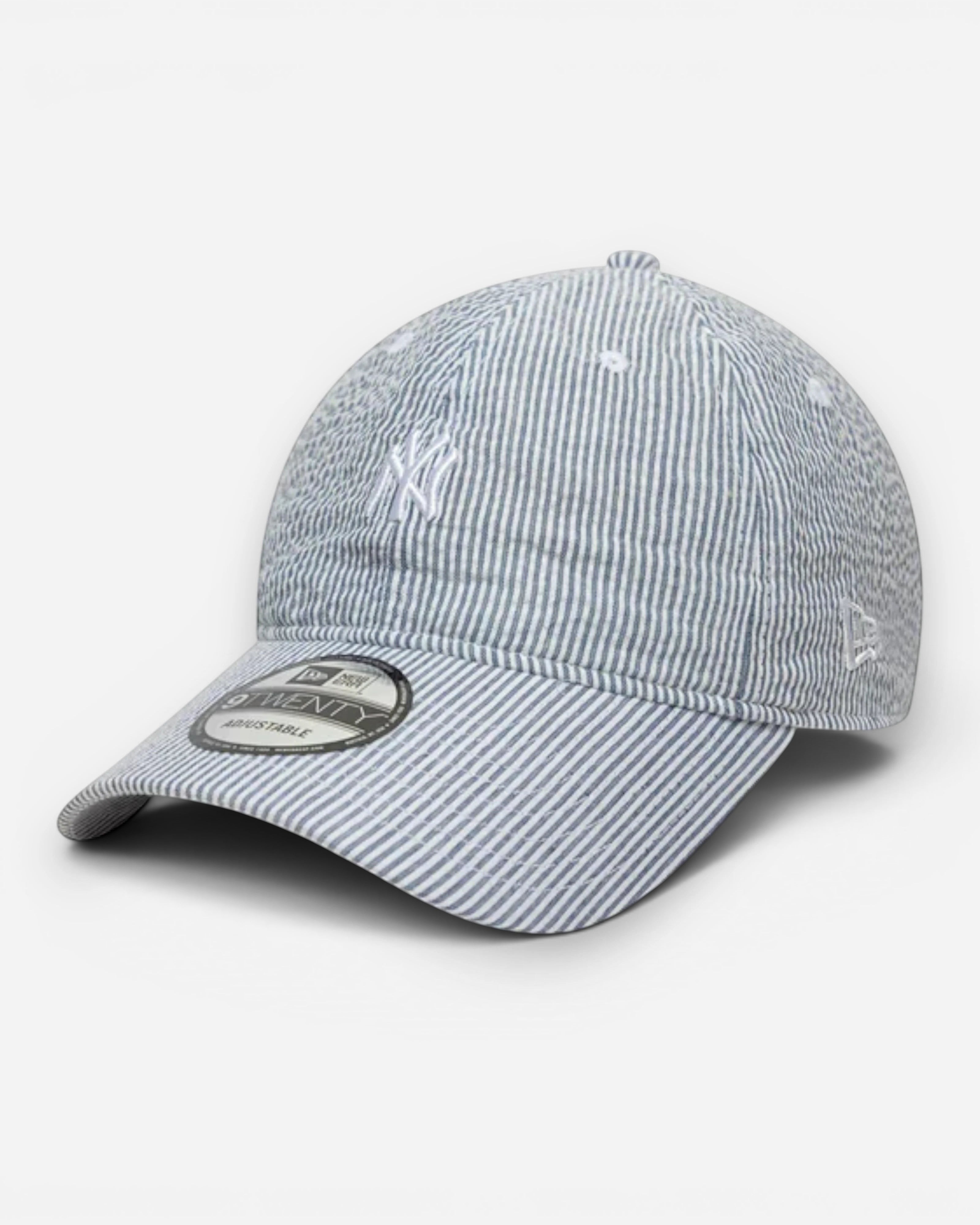 Astrofat New York Yankees 9TWENTY seersucker baseball cap in navy and white with adjustable strapback and curved brim.