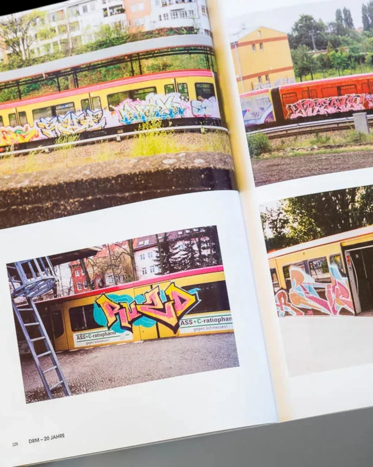 Astrofat NONSTOP Magazine issue 27 featuring colorful graffiti art on Swiss trains in a softcover A4 format.