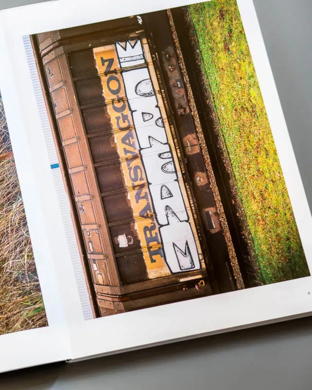 Astrofat Nonstop Magazine issue 27 featuring full-color photography of graffiti art on Swiss train carriages.