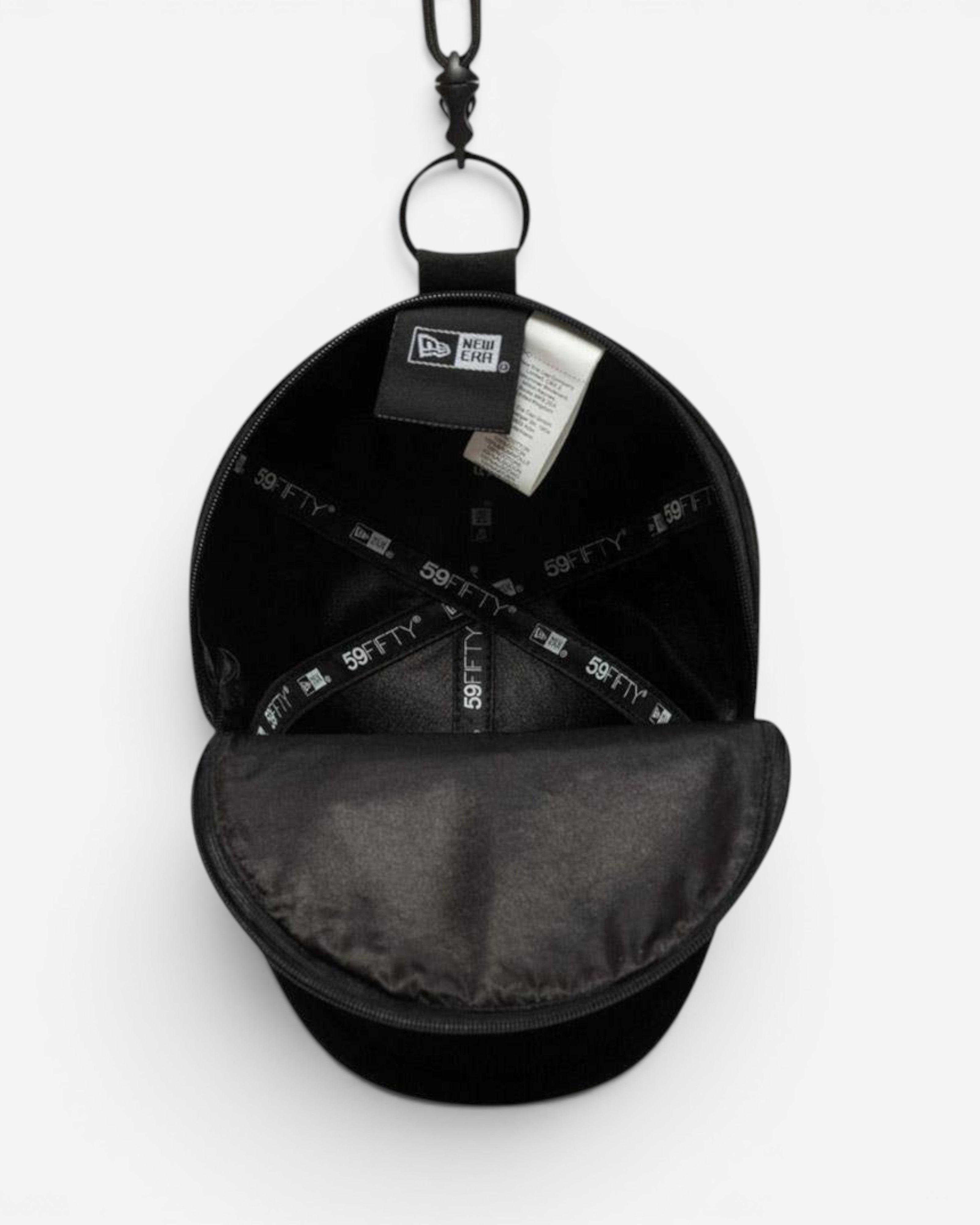Astrofat black NY Yankees MLB mini cap keychain with interior New Era branding and metal hardware.