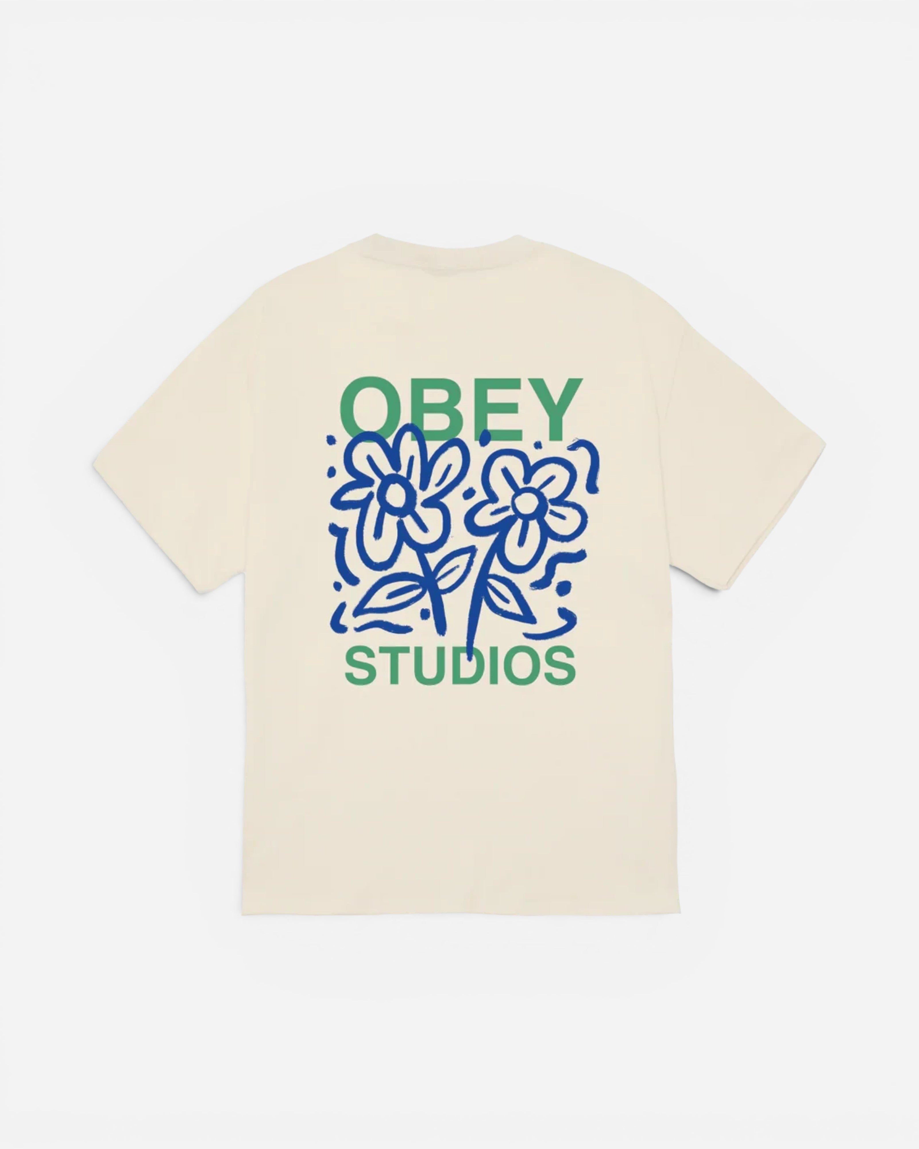 Astrofat Obey cream cotton t-shirt featuring a blue and green floral graphic print on the back