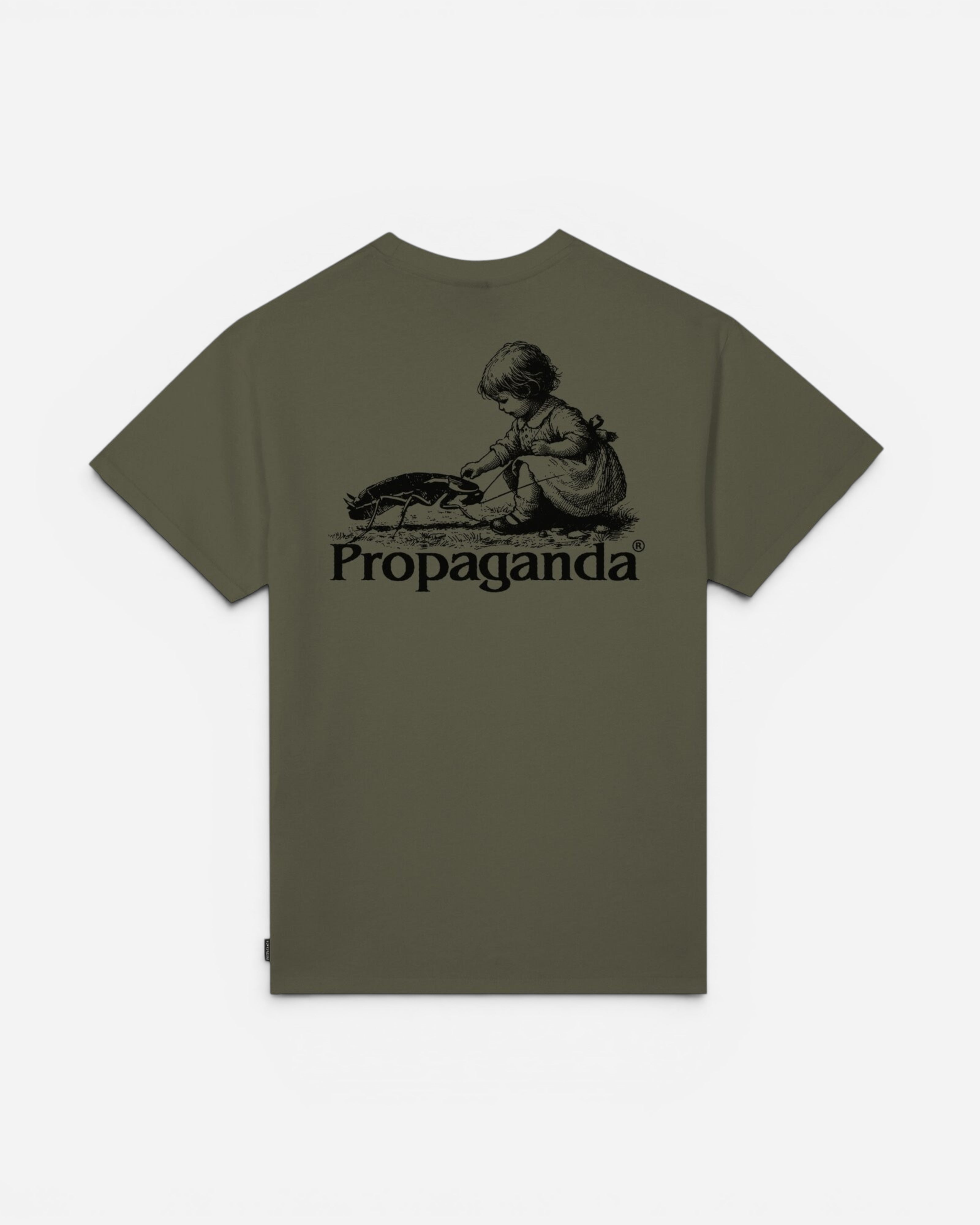 Astrofat olive green cotton t-shirt with a graphic print of a child interacting with a cockroach and the word Propaganda.