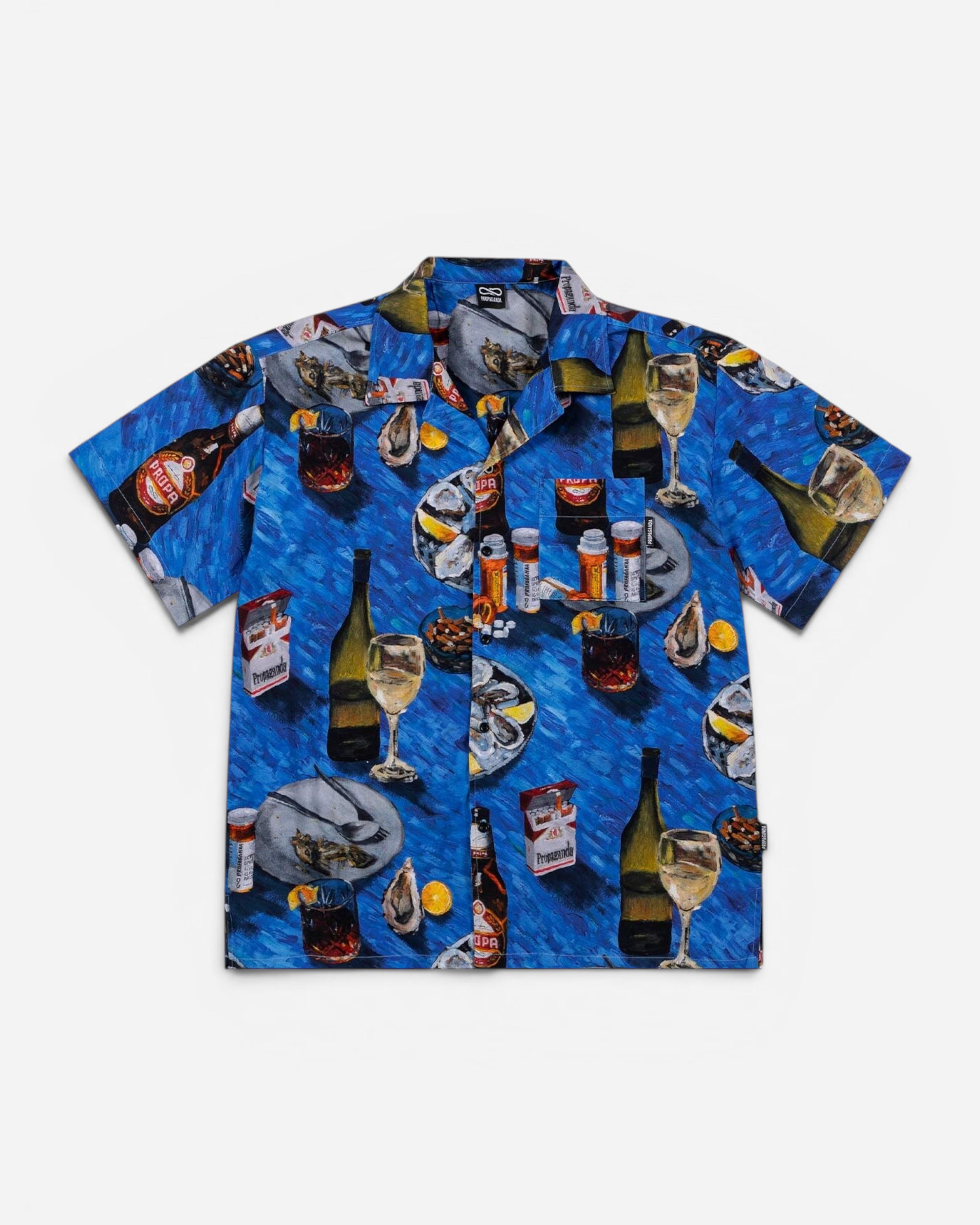 Astrofat short-sleeve cotton shirt in blue with an all-over print of oysters, wine glasses, and bottles.