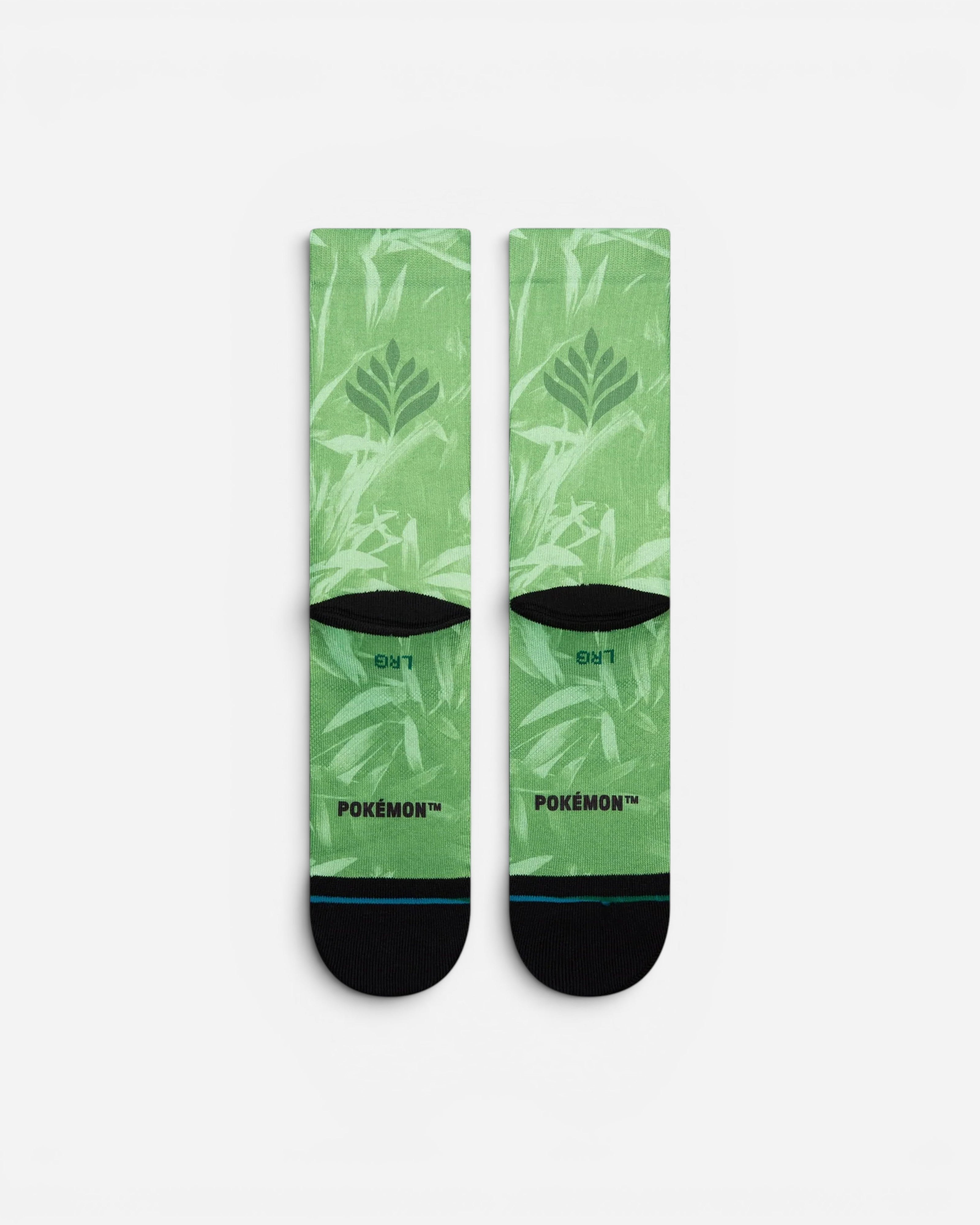 Astrofat green Pokemon Venusaur crew socks with all-over leaf print, medium cushioning, and seamless toe closure.