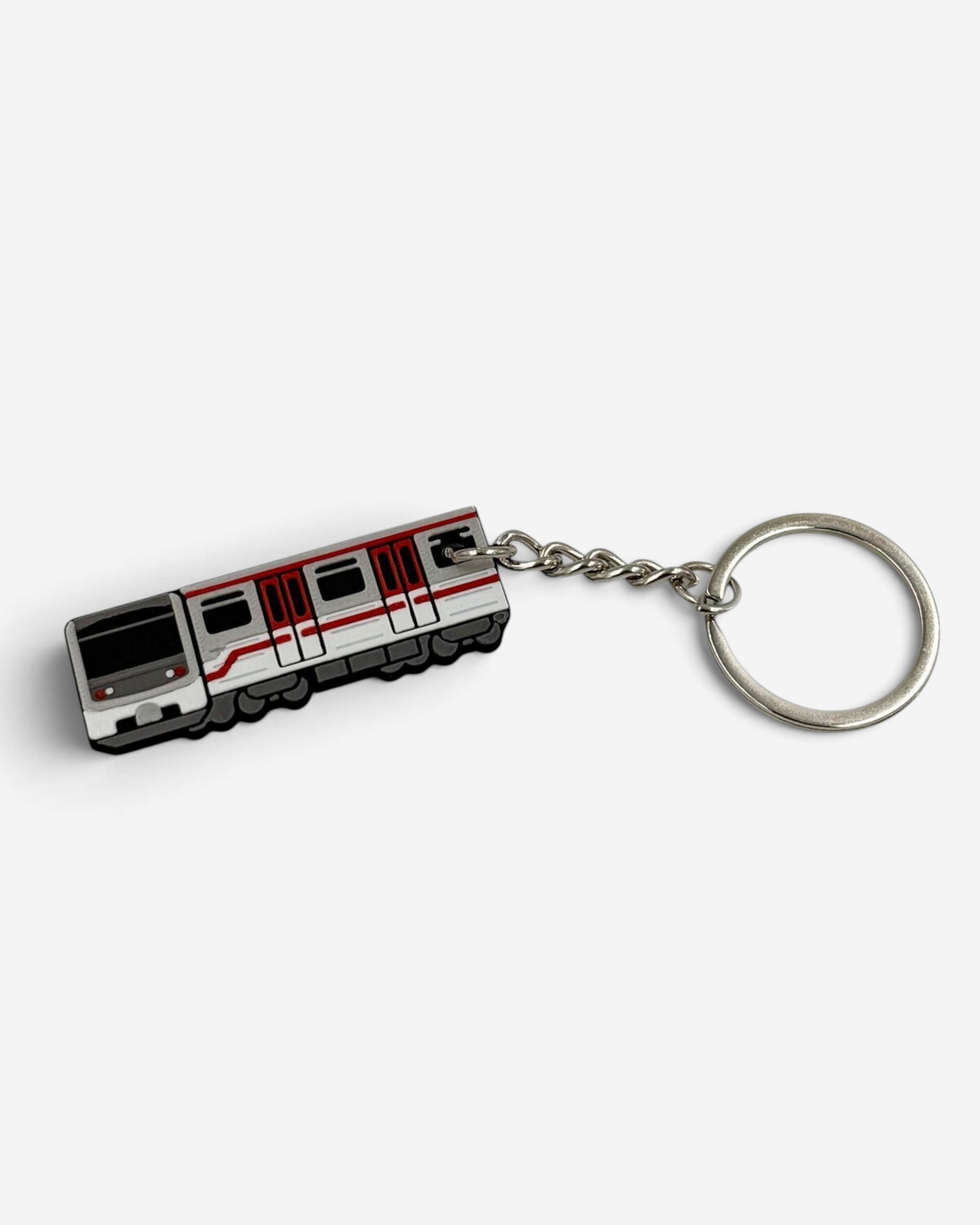 Astrofat Praha Metro keychain featuring a detailed white and red subway train carriage design made with FDM printing.