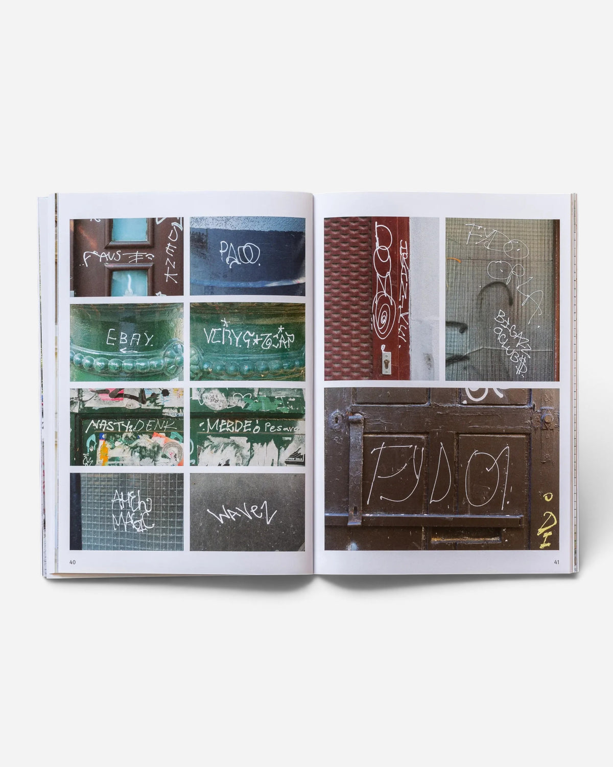 Astrofat Praha Tourist Information zine open to pages 40 and 41 showing a collage of graffiti tags from Prague