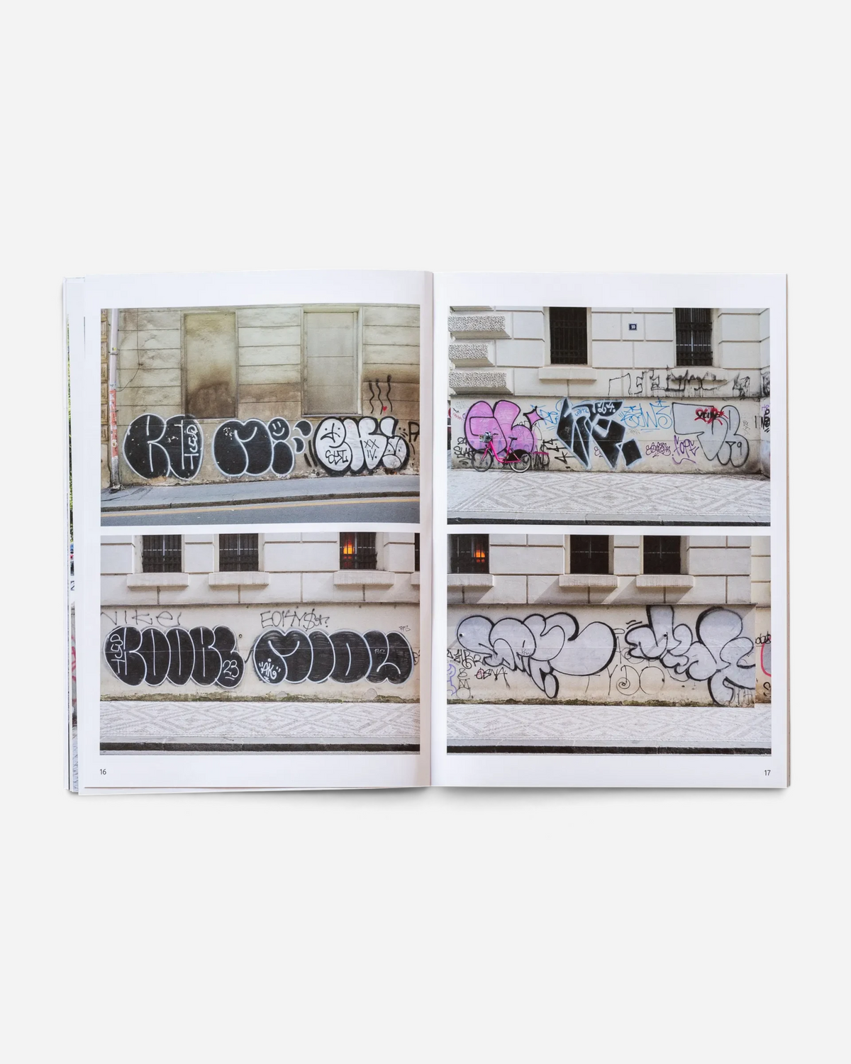 Astrofat Praha Tourist Information zine open to pages 16 and 17 showing photographs of Prague graffiti throw-ups.