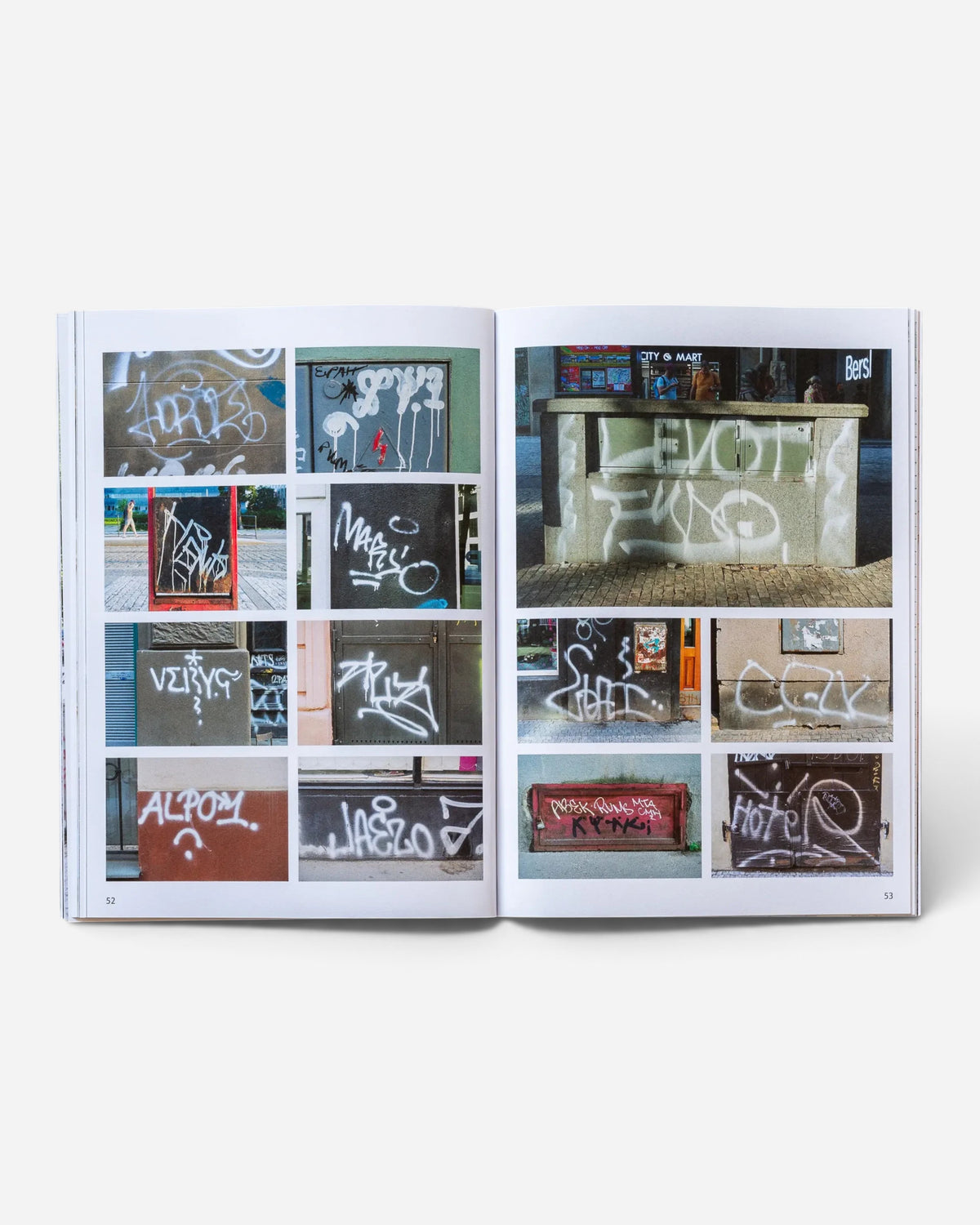 Astrofat Praha Tourist Information zine open to pages 52 and 53 featuring a collage of Prague graffiti tags and throw-ups