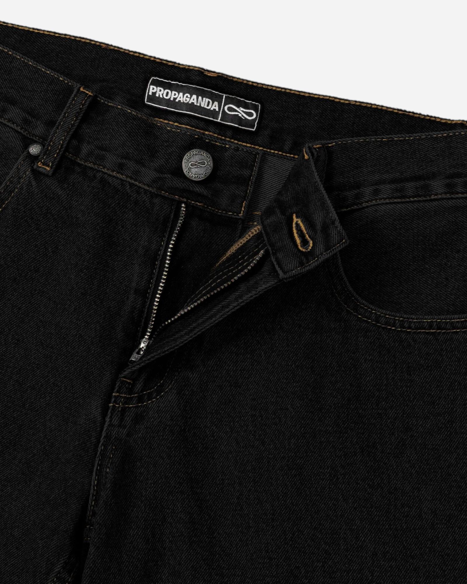 Astrofat Propaganda black denim shorts featuring branded buttons, rivets, and a logo patch on the waistband.