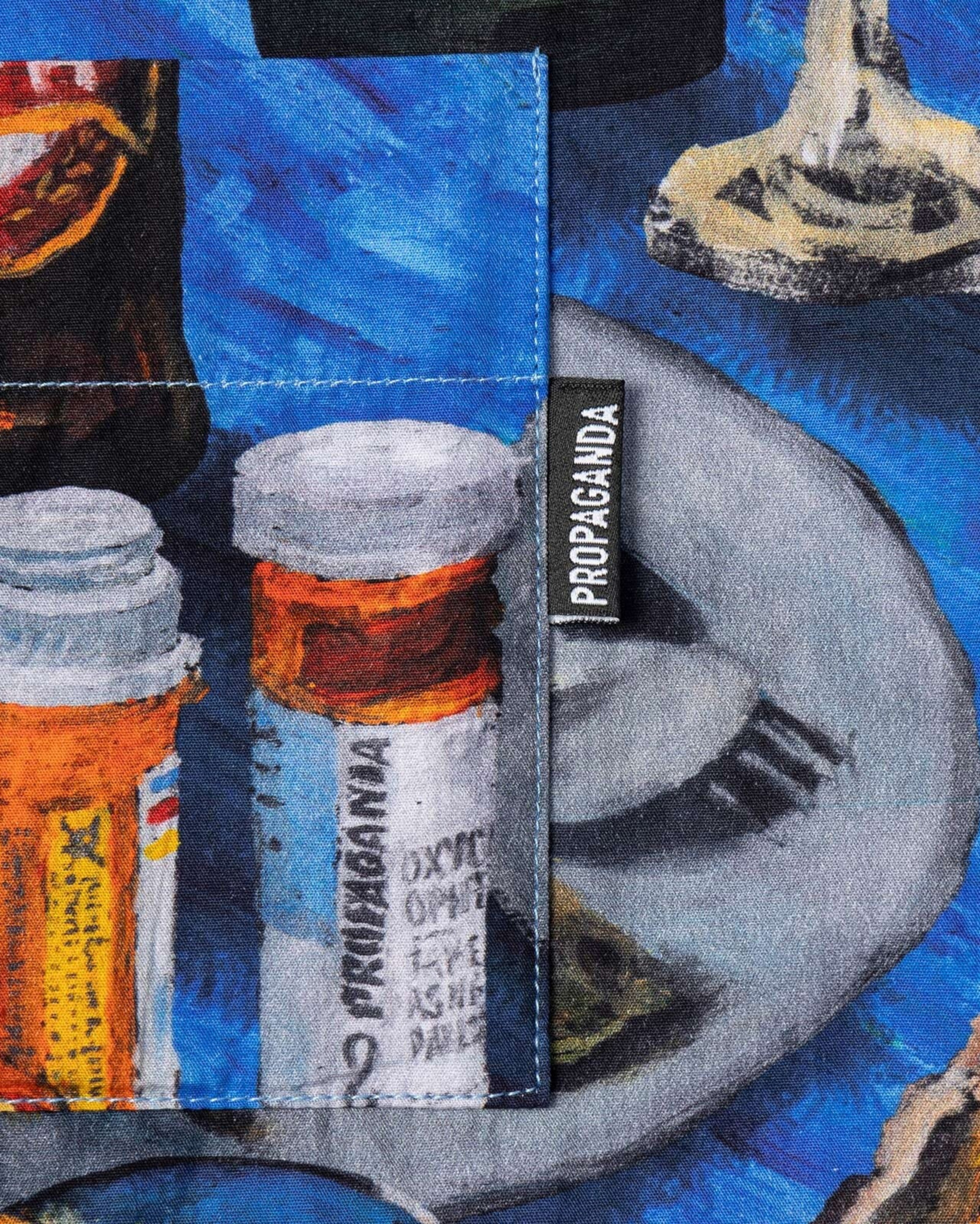 Astrofat Propaganda short-sleeve cotton shirt featuring an all-over oyster and pill bottle print with a woven label.