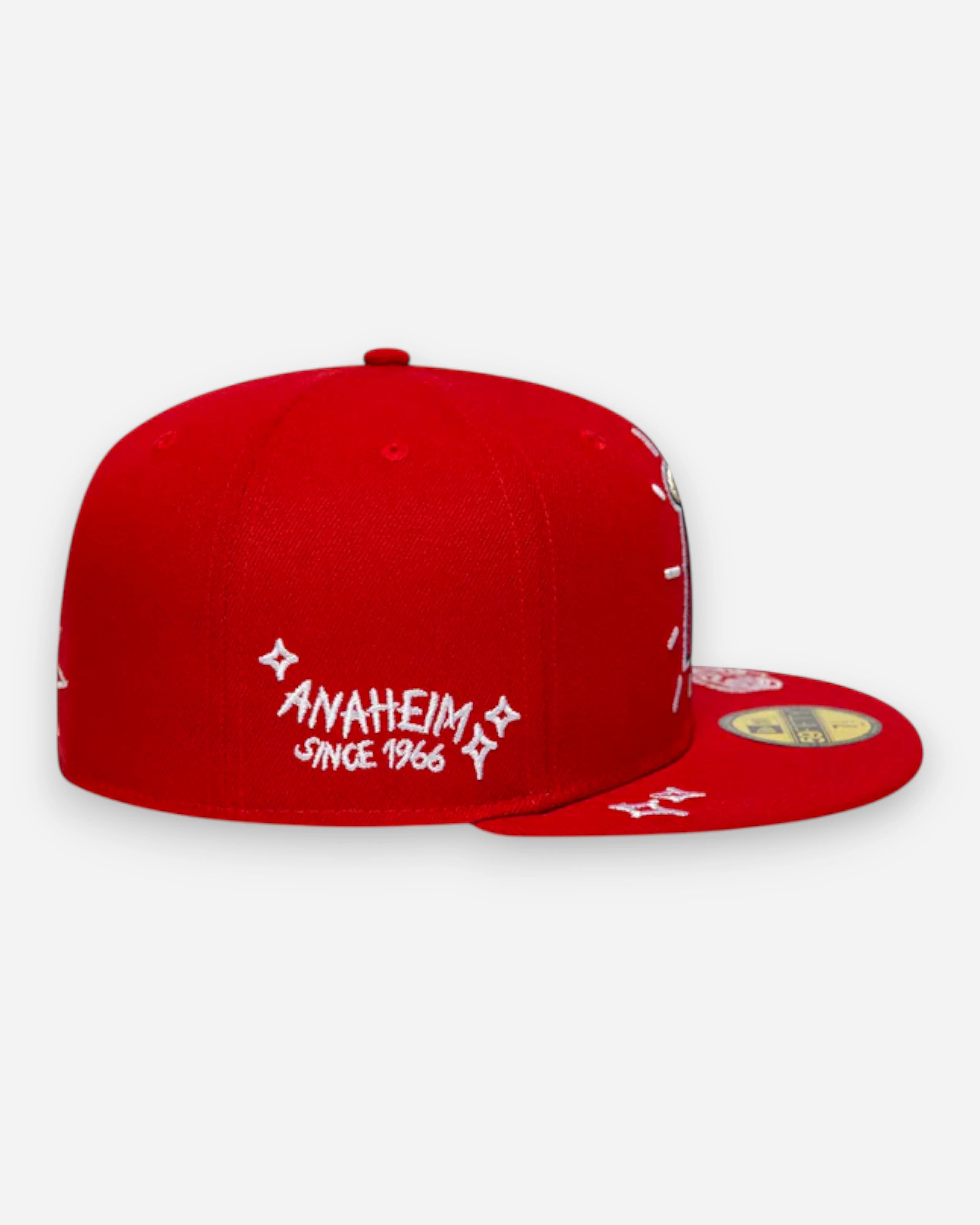 Astrofat red 59FIFTY fitted LA Angels MLB cap with white scribble details and flat brim.