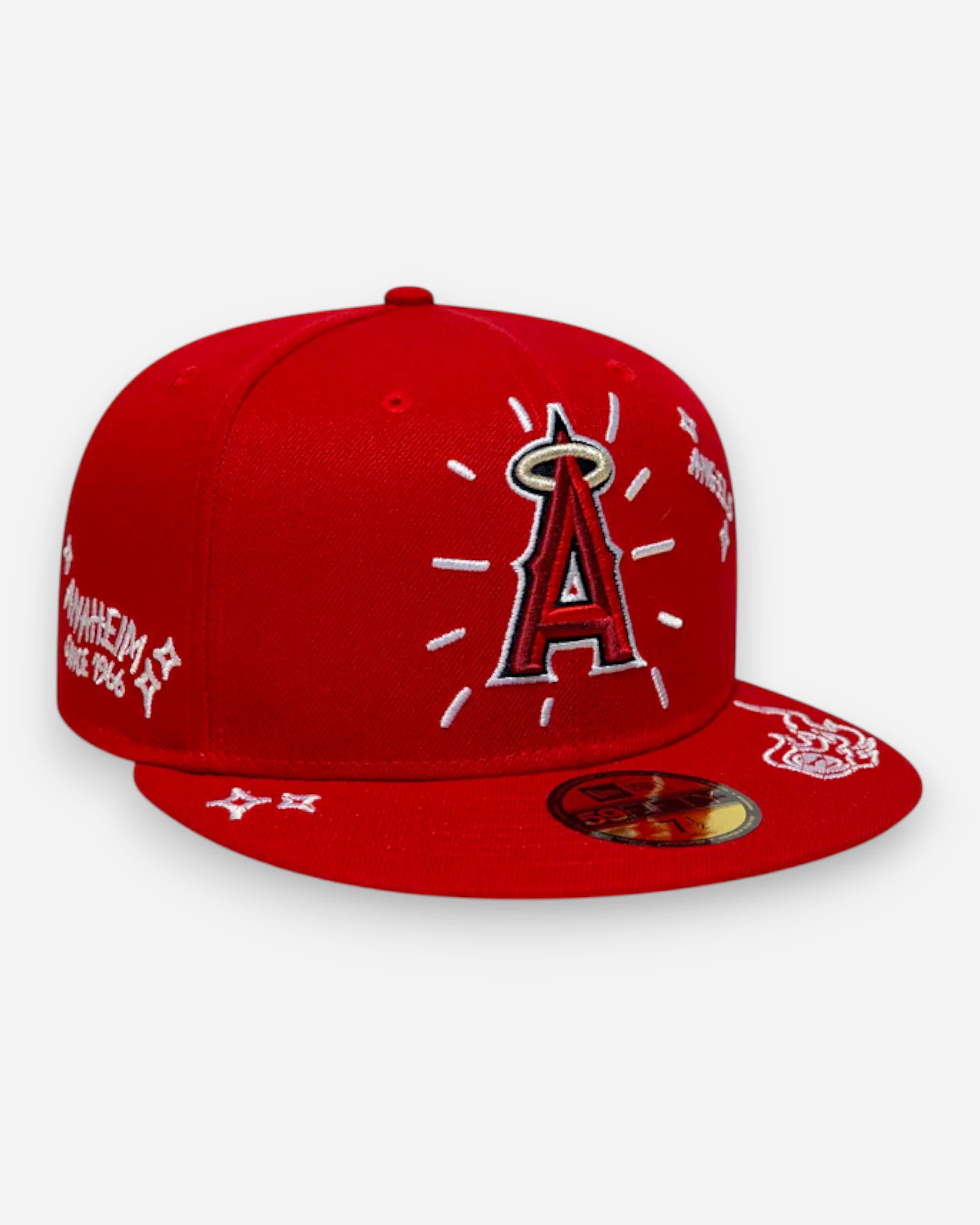 Astrofat red 59FIFTY fitted LA Angels MLB cap with embroidered 'A' logo, 'Since 1961' text, and scribble details.
