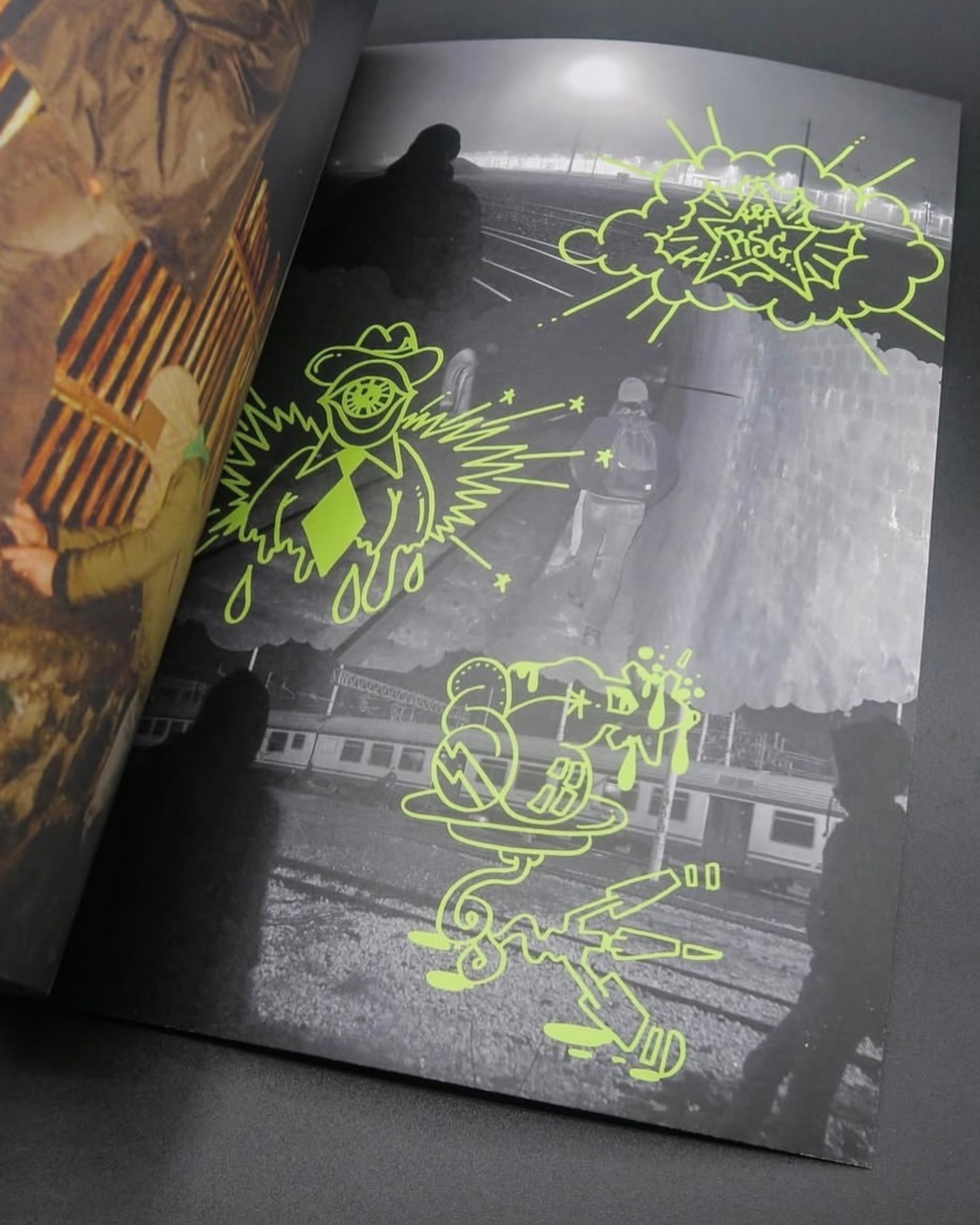 Astrofat Reincarnations The Many Lives of FRA32 book featuring black and white photography with neon green graffiti art