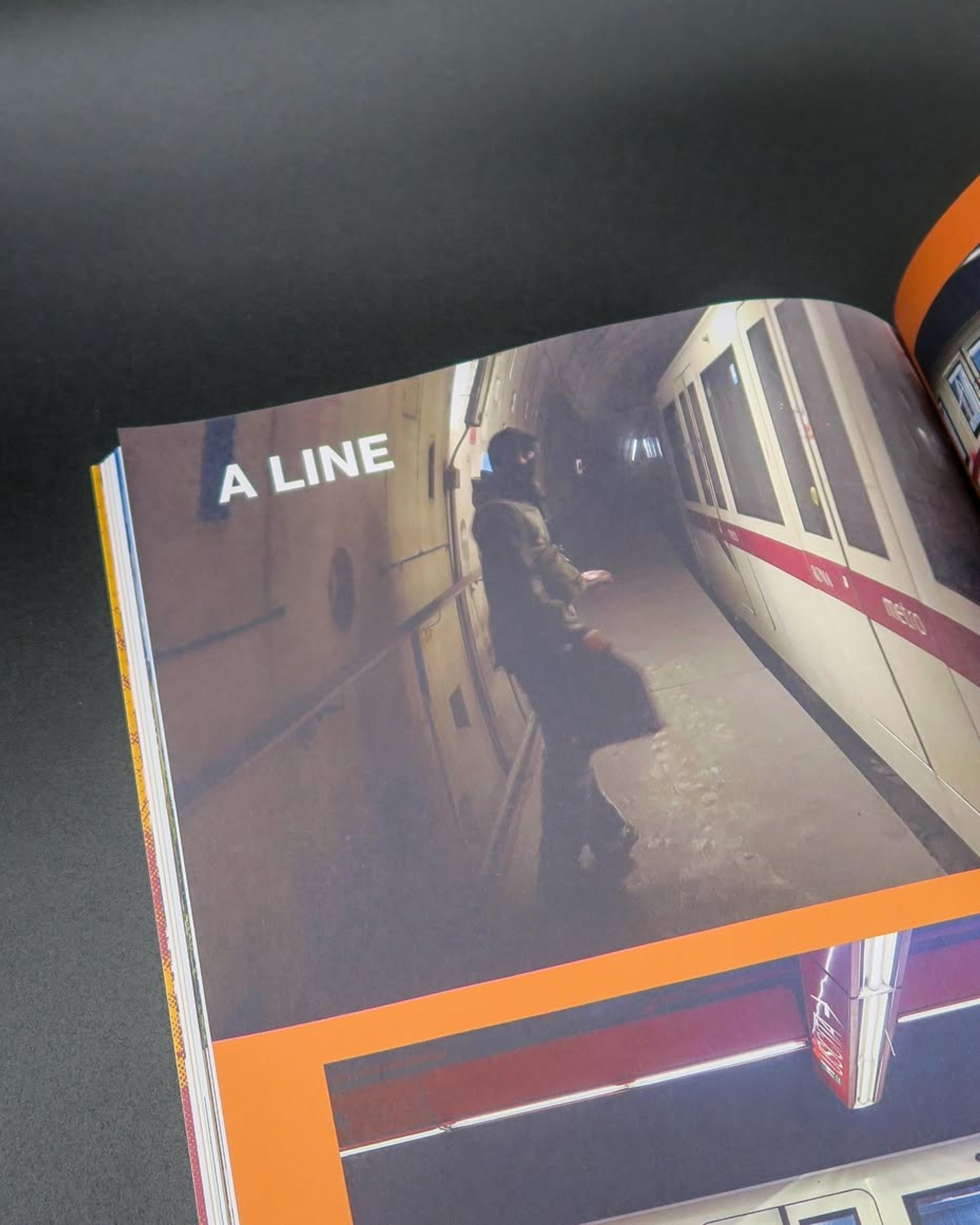 Astrofat We Are The City Eternal Roma 2026 photography book showing a subway station scene with a person on a platform