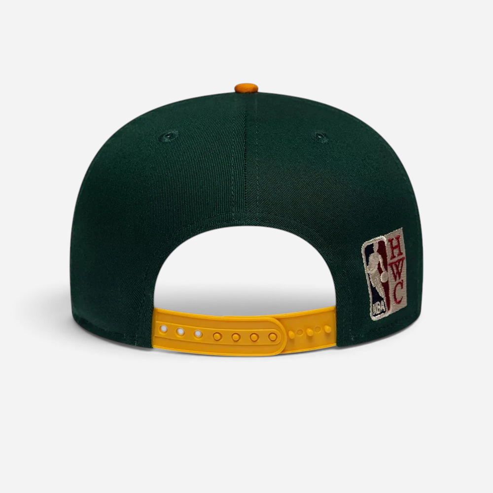 Astrofat Seattle Supersonics 9FIFTY snapback cap in dark green with an orange adjustable strap and NBA HWC back patch.