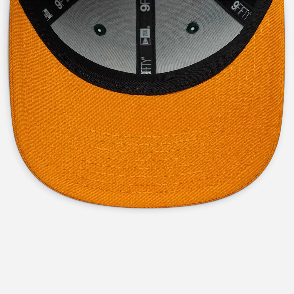 Astrofat Seattle Supersonics 9FIFTY snapback cap featuring a vibrant orange flat visor and structured green crown.