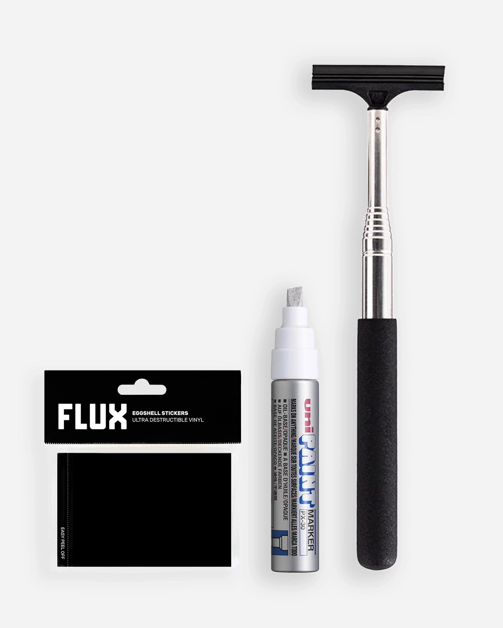 Astrofat sticker bombing kit with 50 Flux eggshell stickers, a silver Unipaint PX-30 marker, and a telescopic pole.
