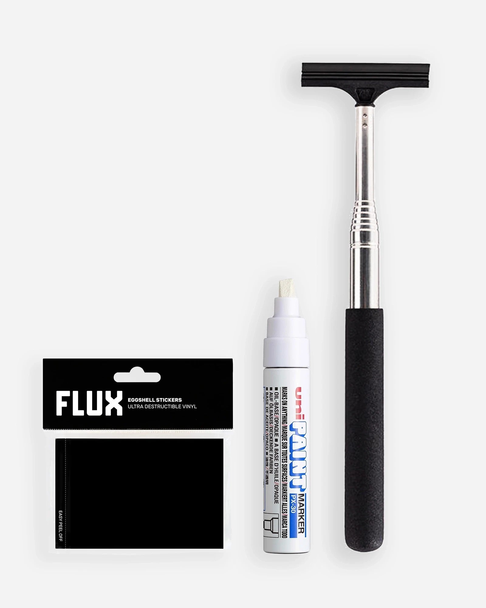 Astrofat sticker bombing kit with 50 Flux eggshell stickers, a white Unipaint PX-30 marker, and a telescopic pole.