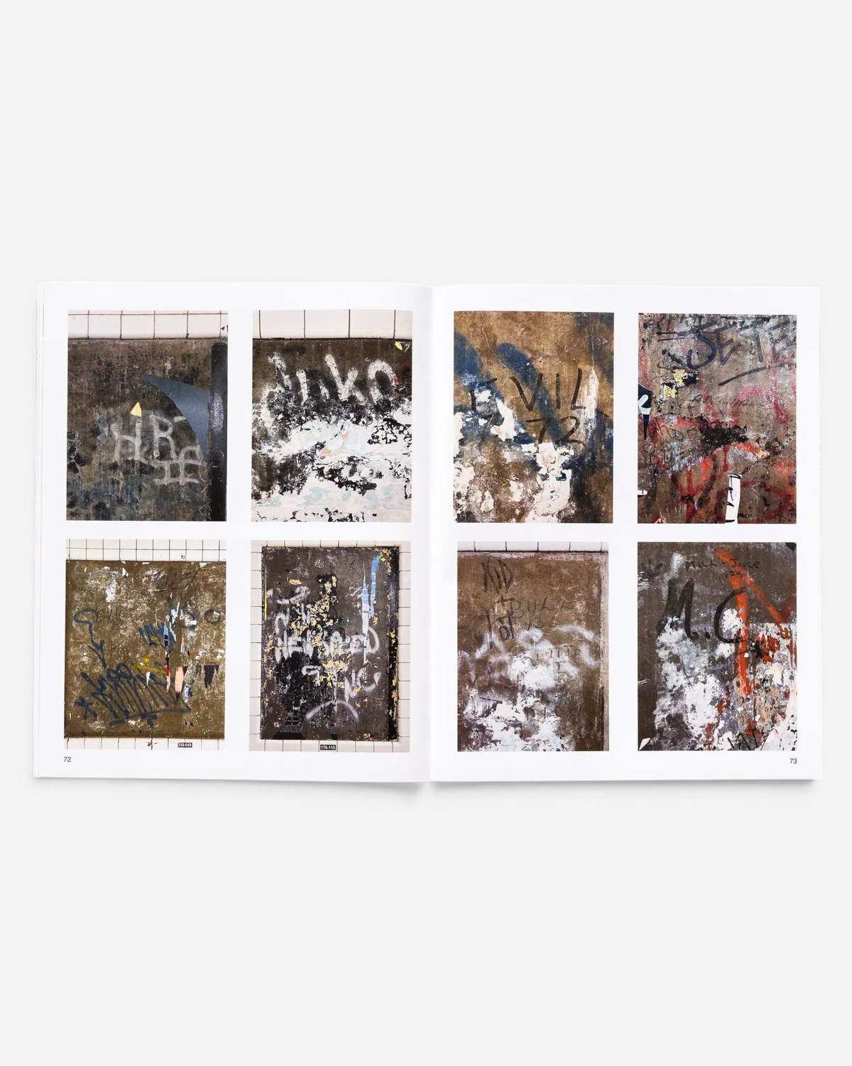 Astrofat Tag Town book open to pages 72 and 73 showing Martha Cooper's archival graffiti tag photography