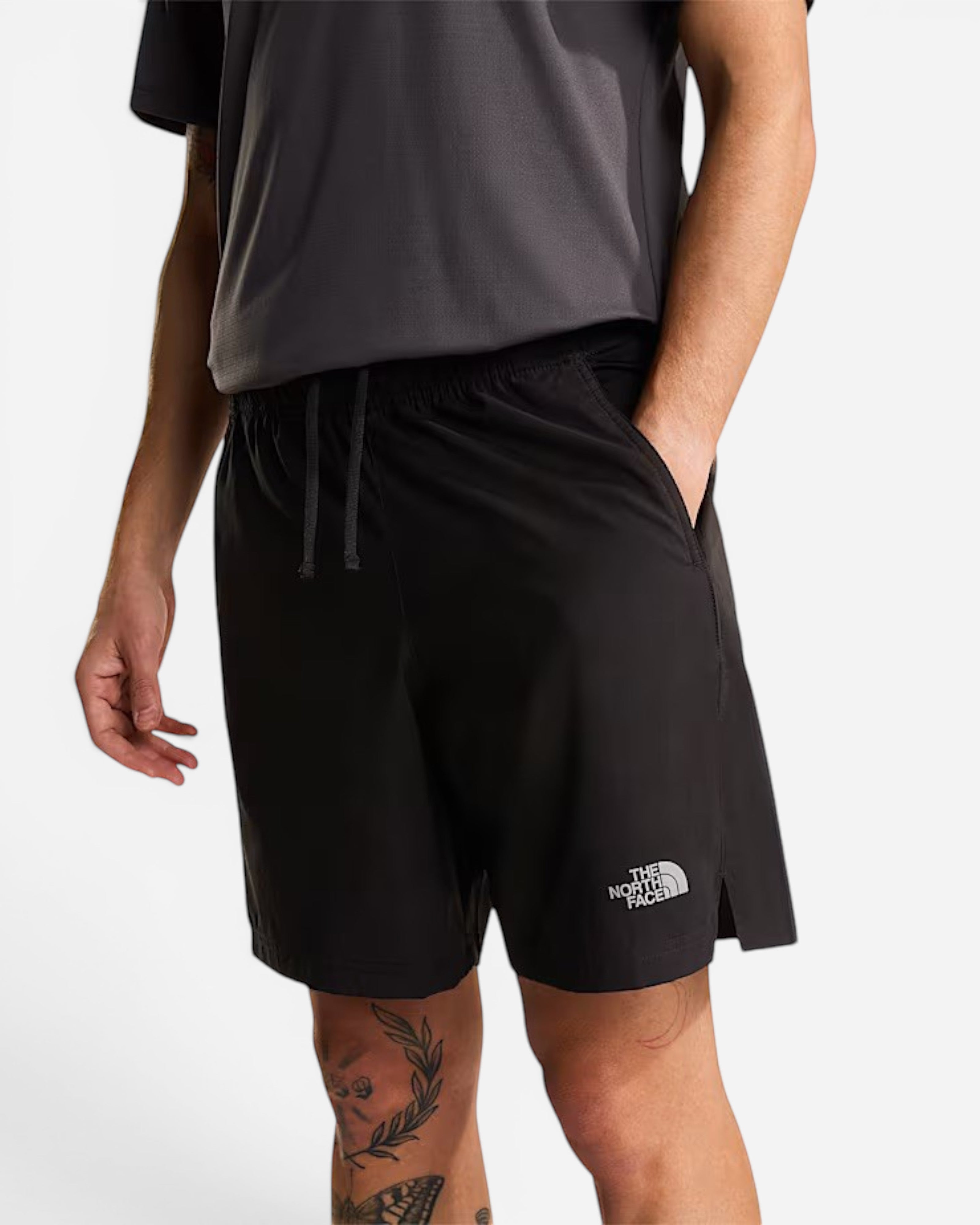 Astrofat The North Face black athletic shorts with FlashDry technology, drawstring waist, and zippered pocket.