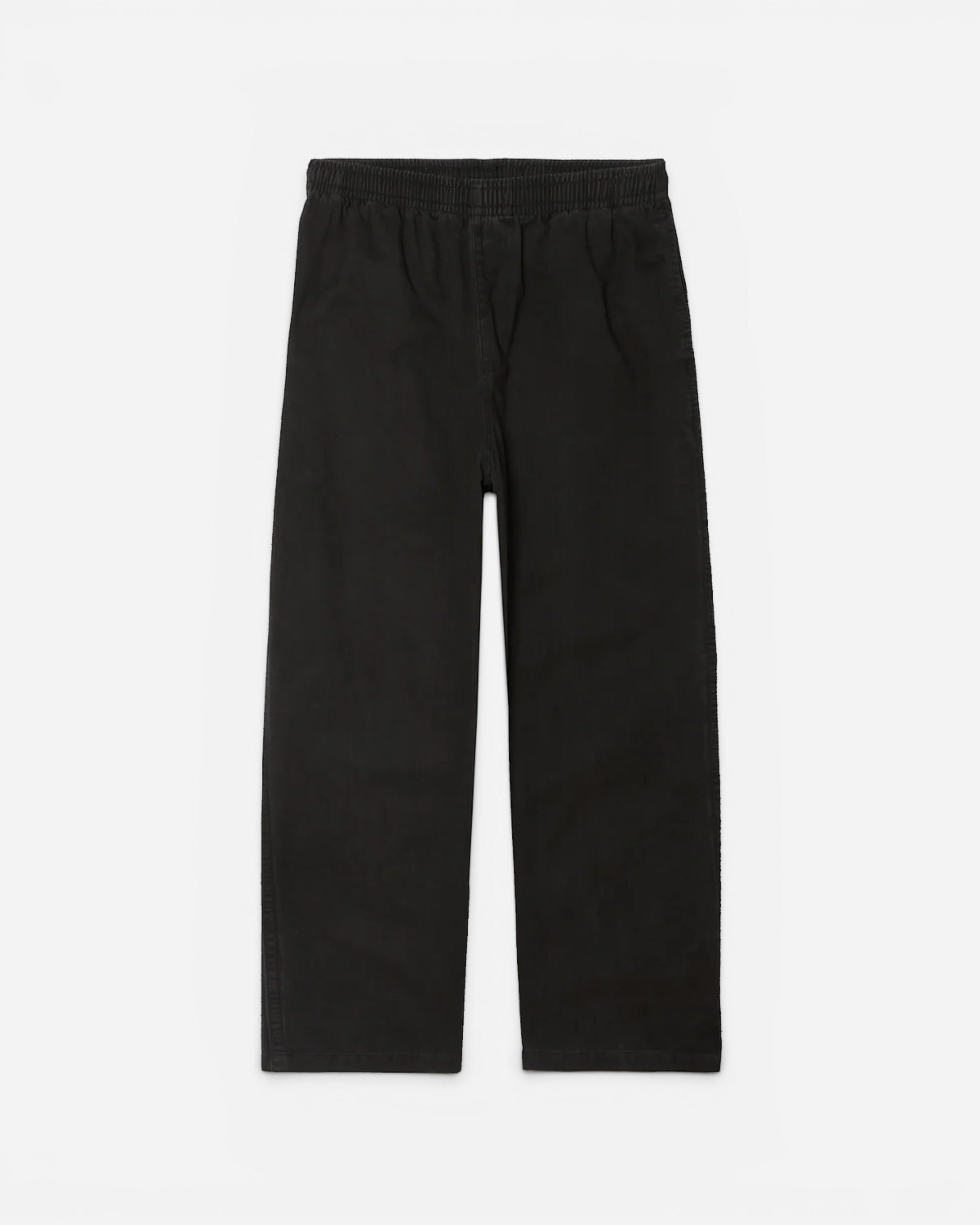 Astrofat Theo Easy Pants in black faded wash cotton. Features elastic waistband, drawstring, front and back pockets, and a tapered leg.