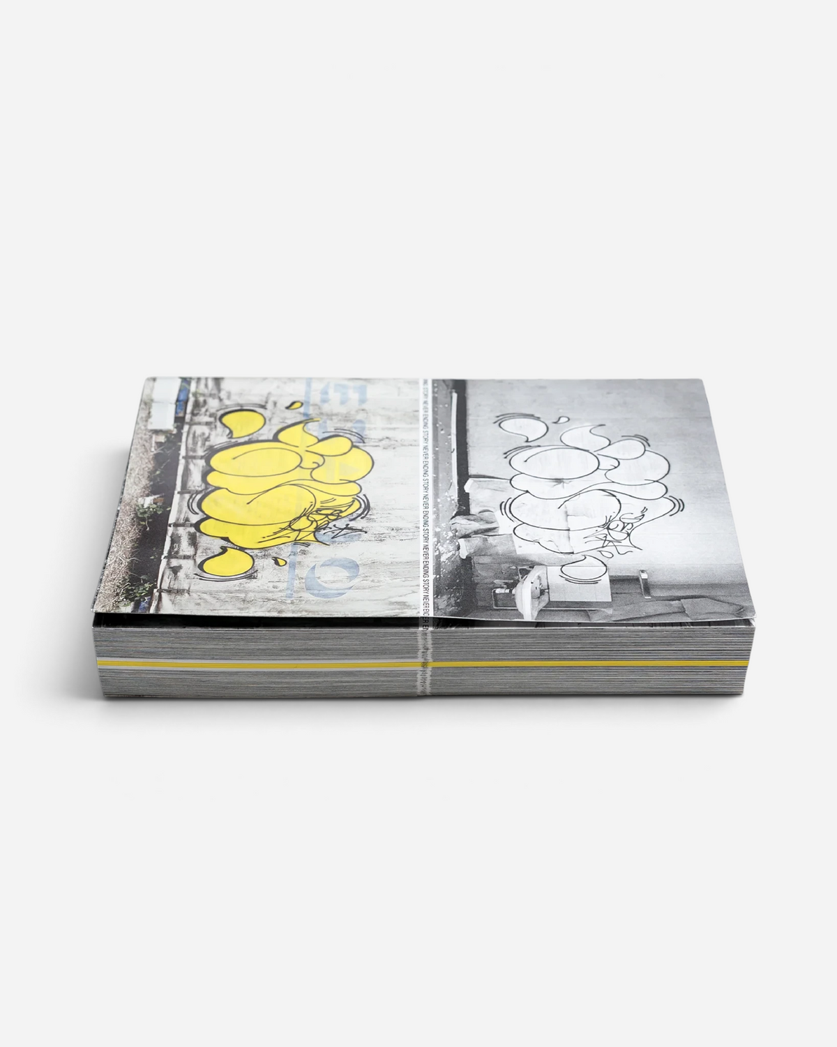 Astrofat Tilt Never Ending Story graffiti book with Swiss binding showing yellow throw-up art on the cover