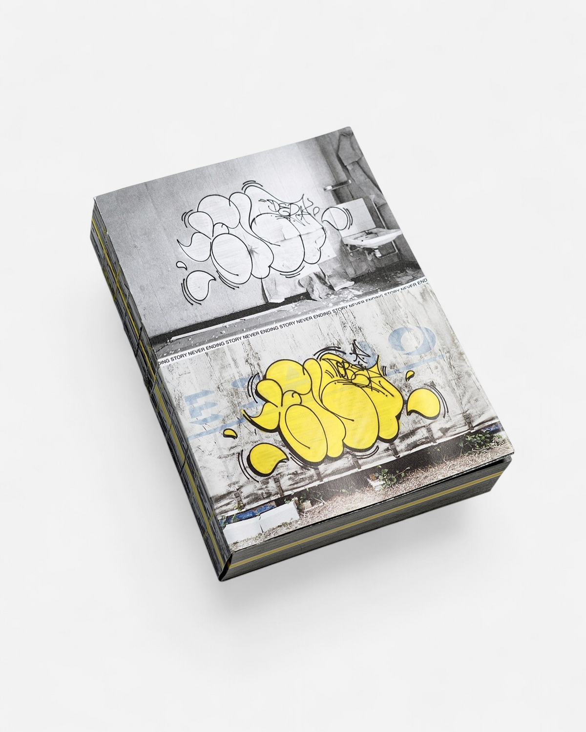 Astrofat Tilt Never Ending Story graffiti book with a yellow throw-up cover design and Swiss binding