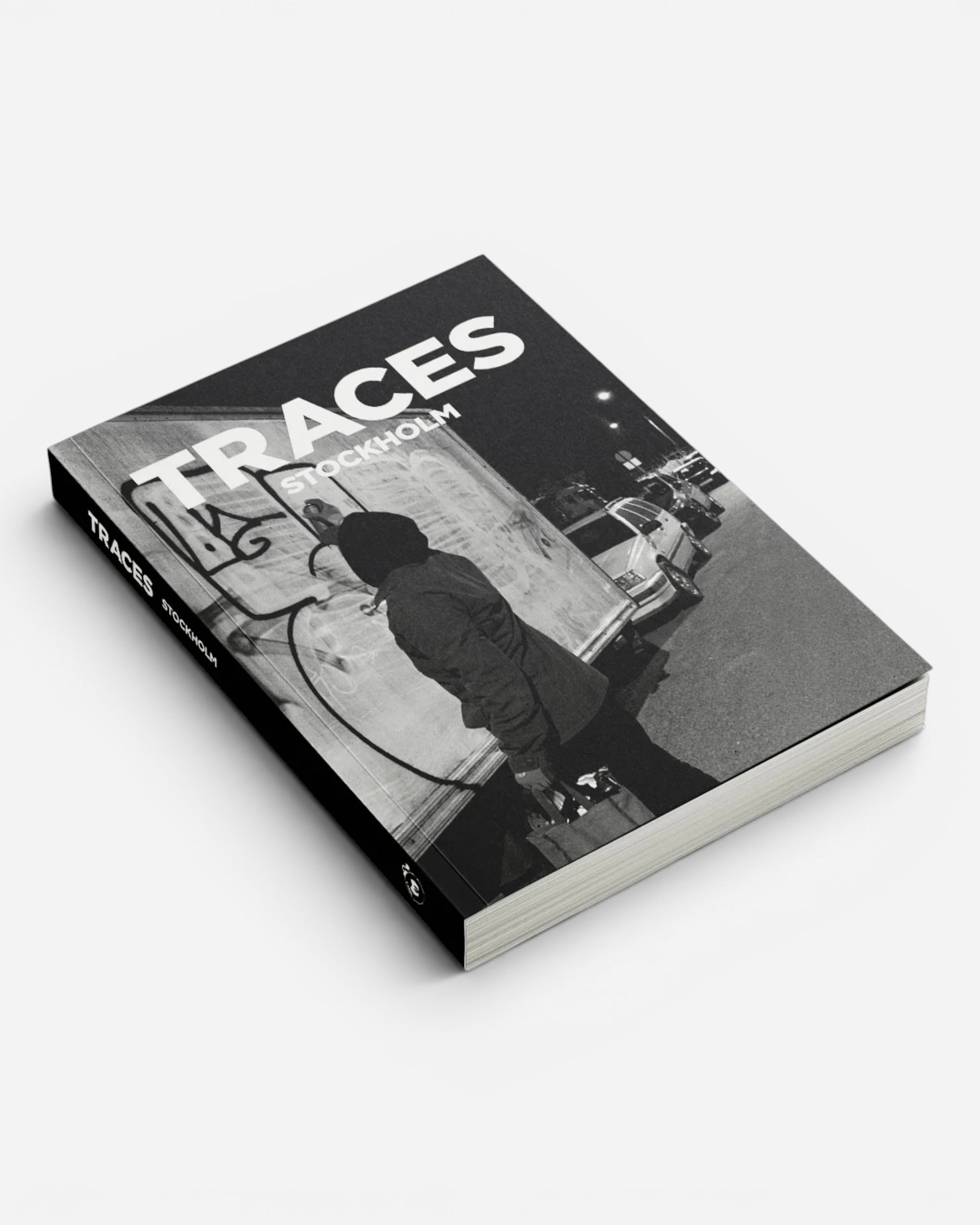 Astrofat Traces Stockholm book, featuring black and white graffiti photography from 2000-2025. Softcover, 204 pages.