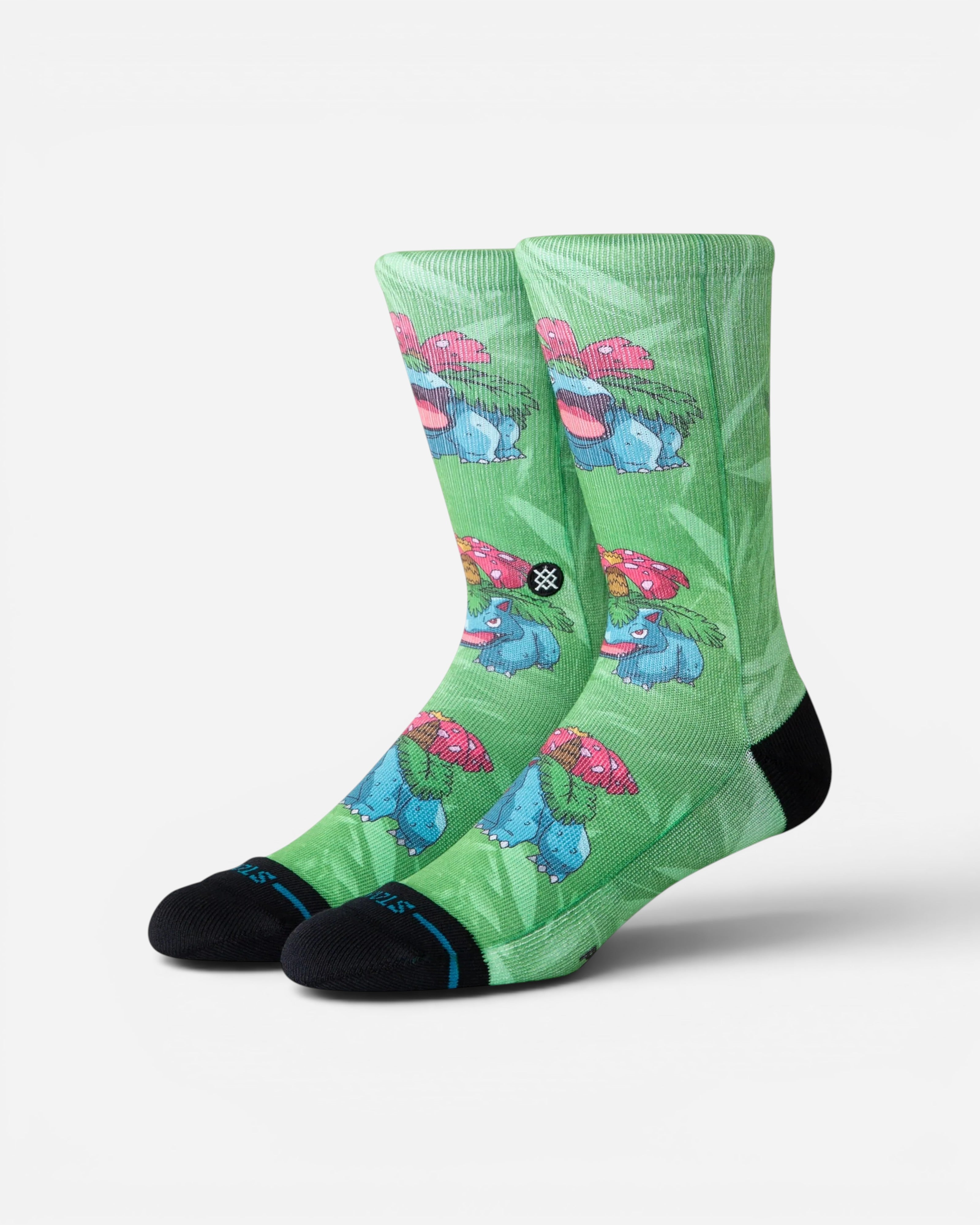 Astrofat green crew socks featuring an all-over Venusaur Pokemon print with black toe and heel detailing.