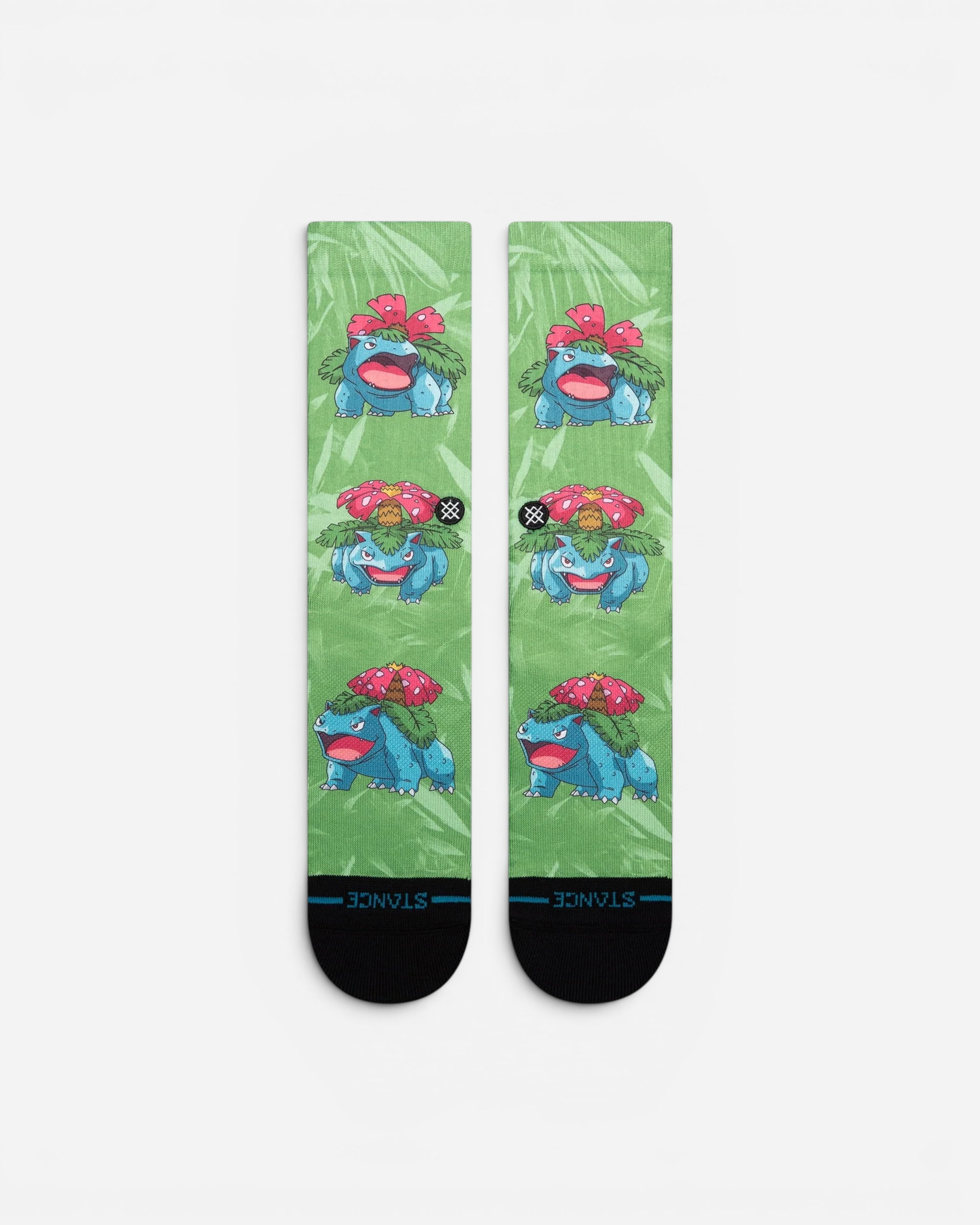 Astrofat green crew socks featuring an all-over Venusaur Pokemon print with medium cushioning and arch support.