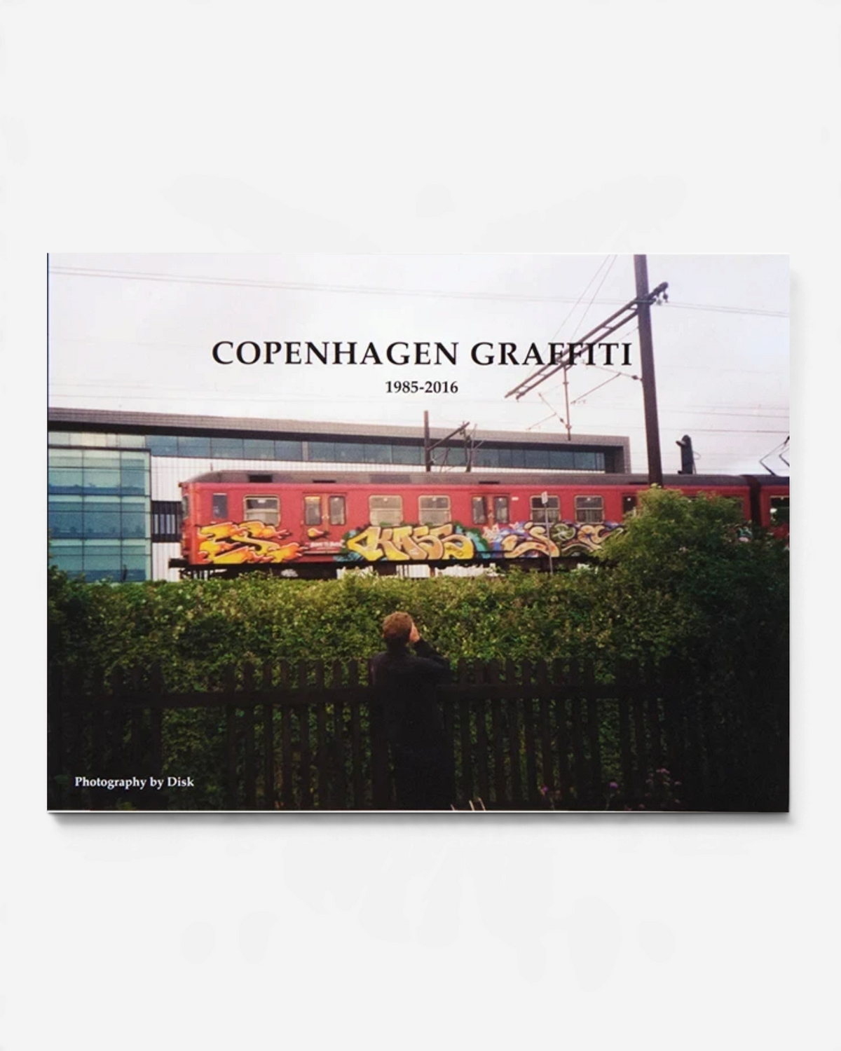 Astrofat Copenhagen Graffiti 1985-2016 exhibition catalog cover featuring a train with graffiti art