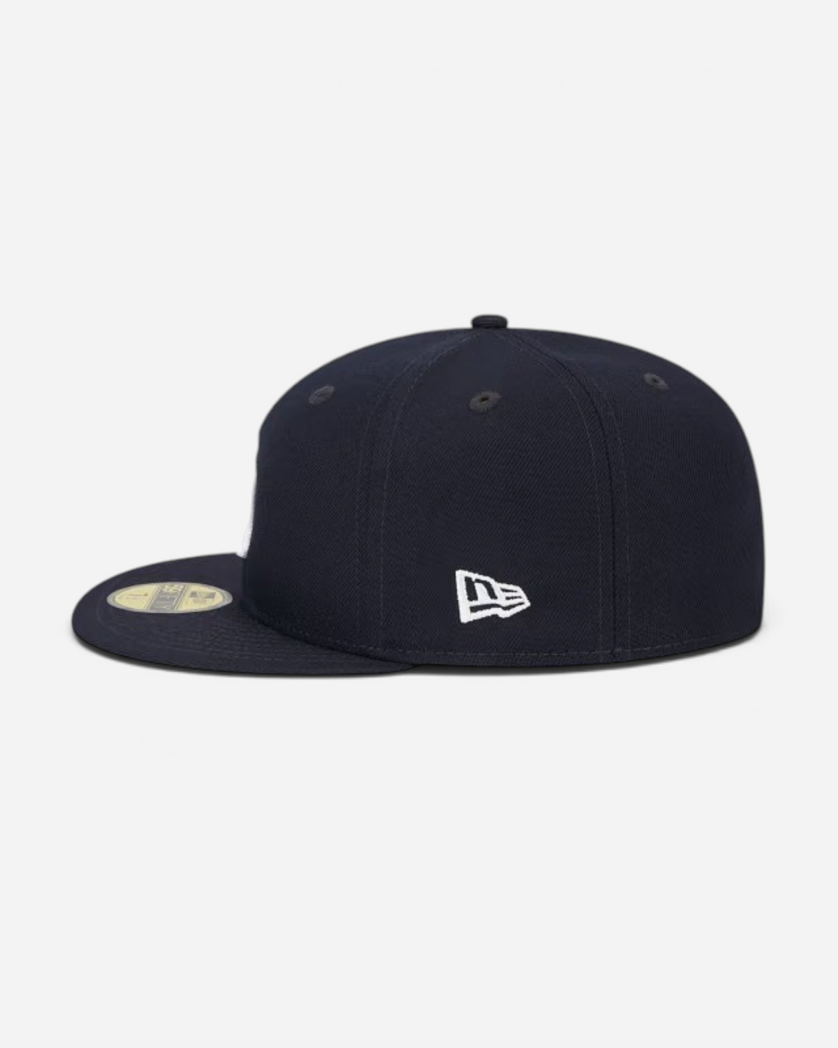Astrofat navy blue New York Yankees 59FIFTY fitted cap with a structured crown and flat visor, side view.